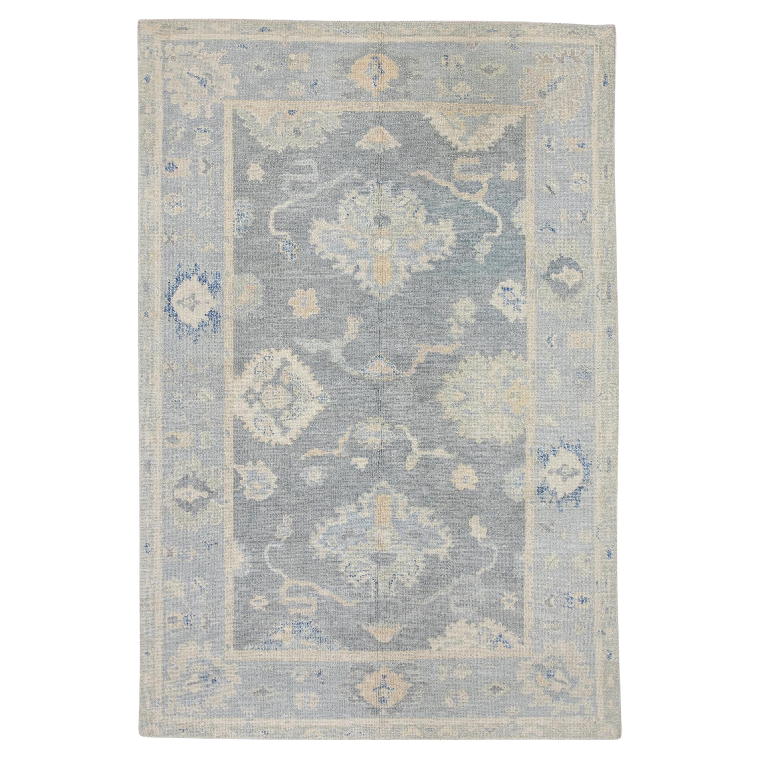 Blue Handwoven Wool Turkish Oushak Rug in Floral Design 5'10" x 8'6" For Sale