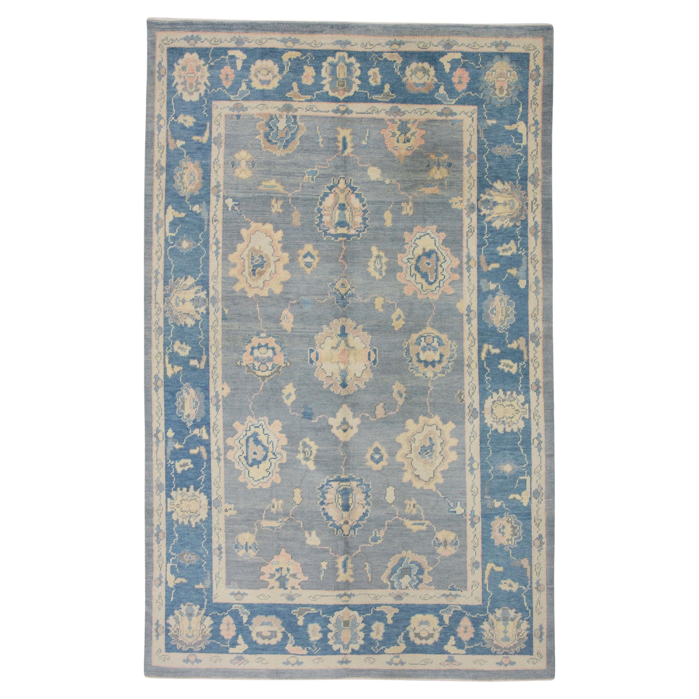 Blue and Pink Floral Handwoven Wool Turkish Oushak Rug 6'2" x 9'11" For Sale