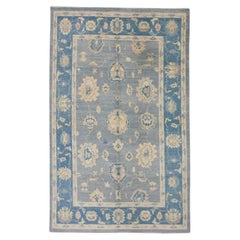 Türkischer Oushak-Teppich aus handgewebter Wolle in Blau und Rosa mit Blumenmuster 6'2" x 9'11"
