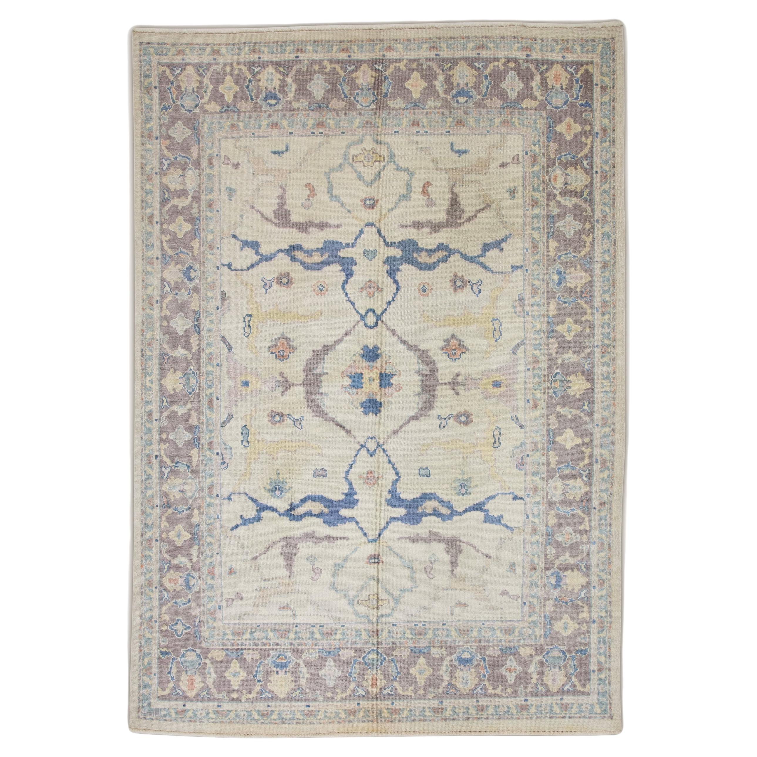 Mauve and Blue Floral Handwoven Wool Turkish Oushak Rug 6'11" x 10'