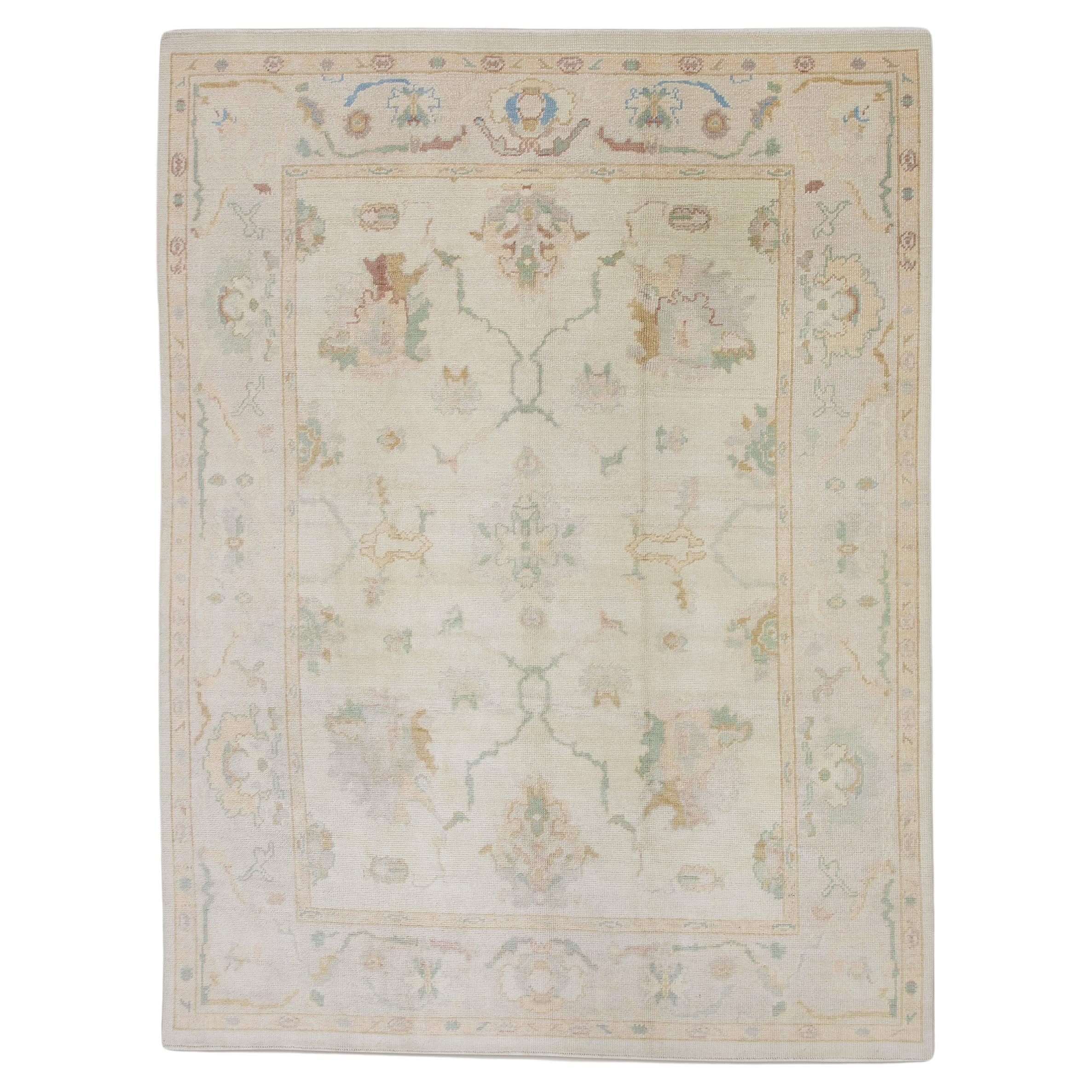 Handwoven Wool Floral Turkish Oushak Rug in Soft Pink, Green, Blue 6'10" x 9'1" For Sale