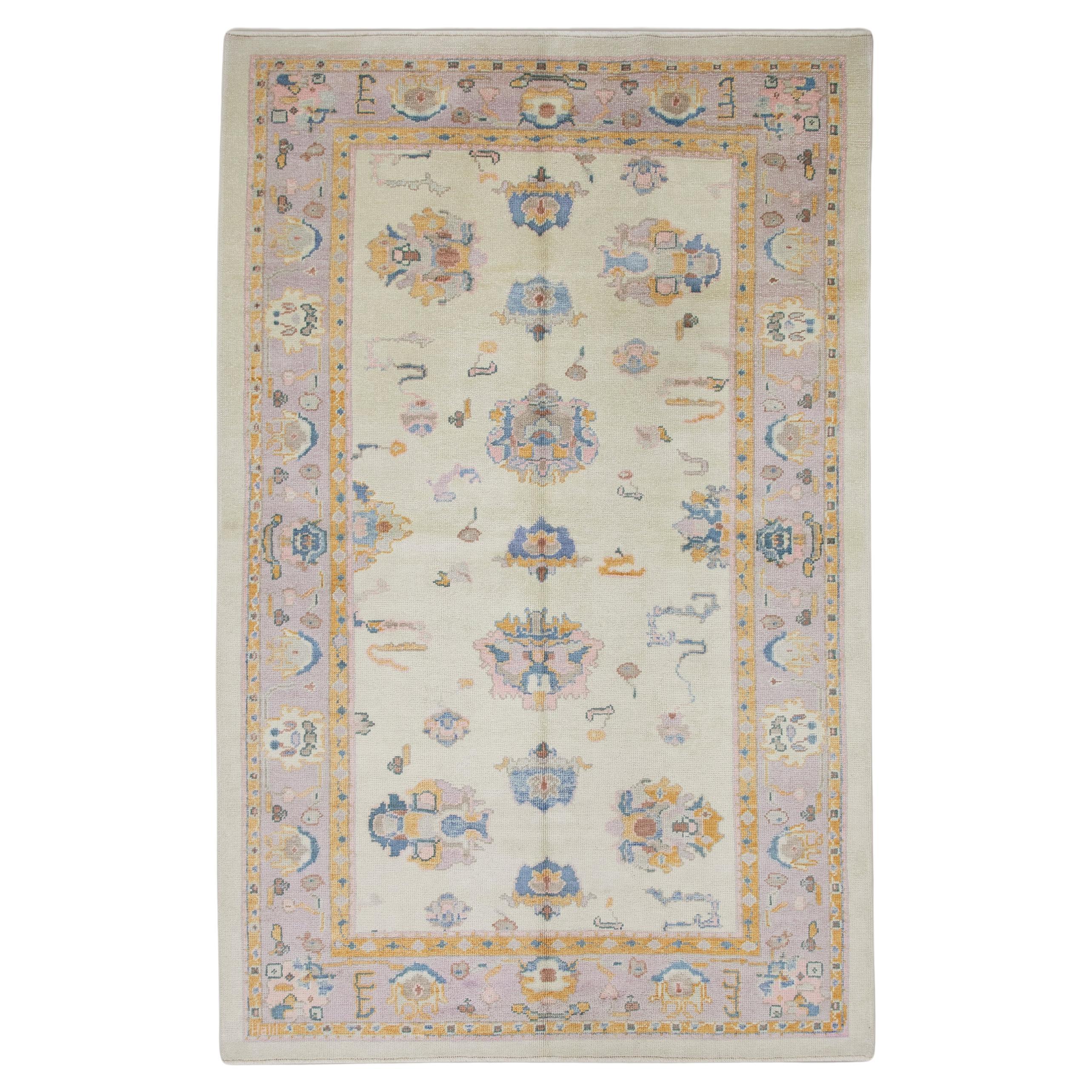 Lilac, Orange, and Blue Floral Handwoven Wool Turkish Oushak Rug 6'2" x 10' For Sale