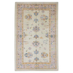Lilac, Orange, and Blue Floral Handwoven Wool Turkish Oushak Rug 6'2" x 10'