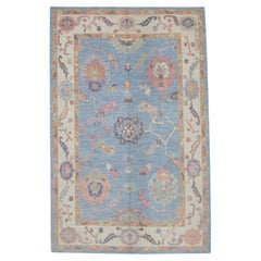 Handwoven Wool Turkish Oushak Rug in Blue, Pink, Orange Floral Design 6
5"x9
10"