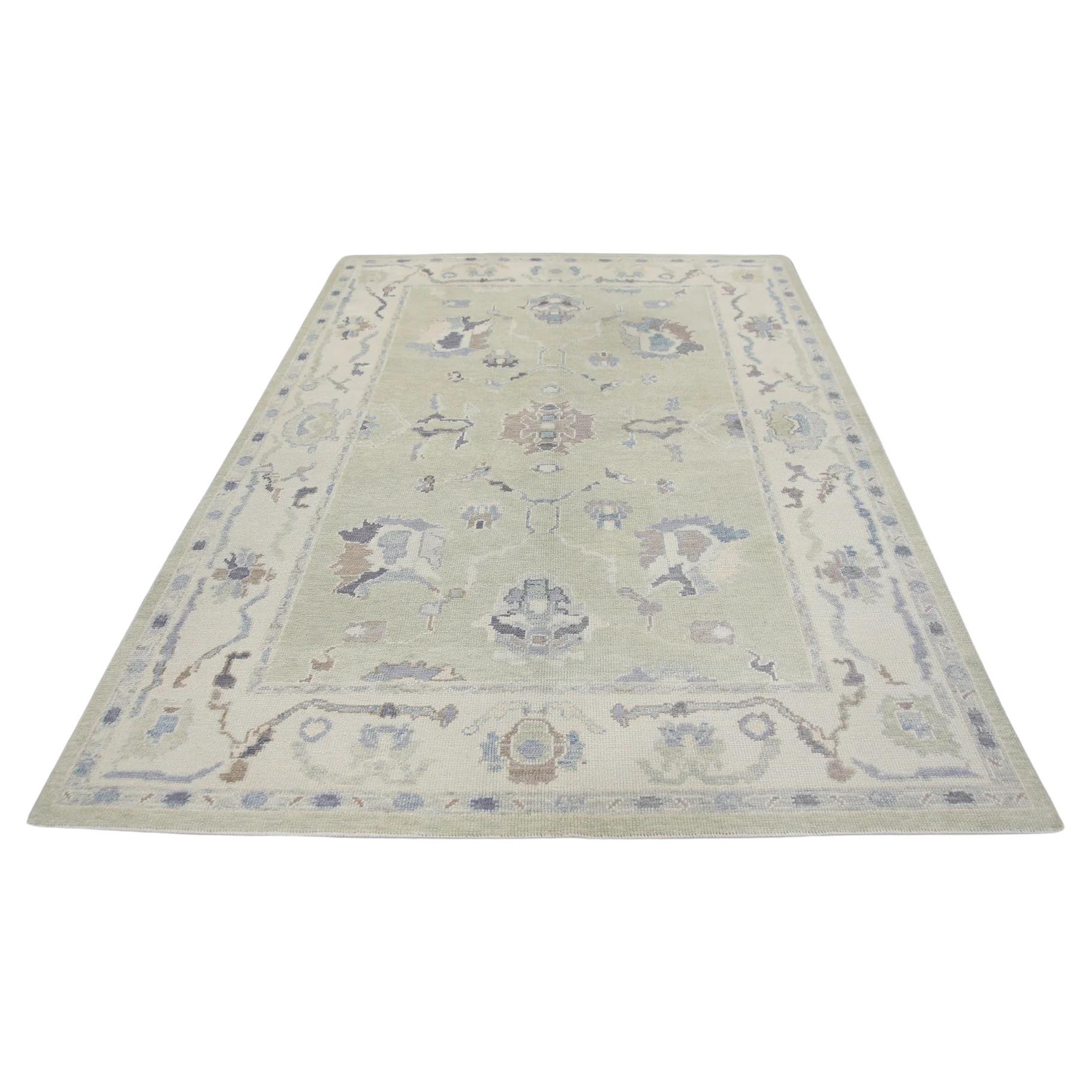 Pale Green Floral Handwoven Wool Turkish Oushak Rug 6' x 8'7" For Sale