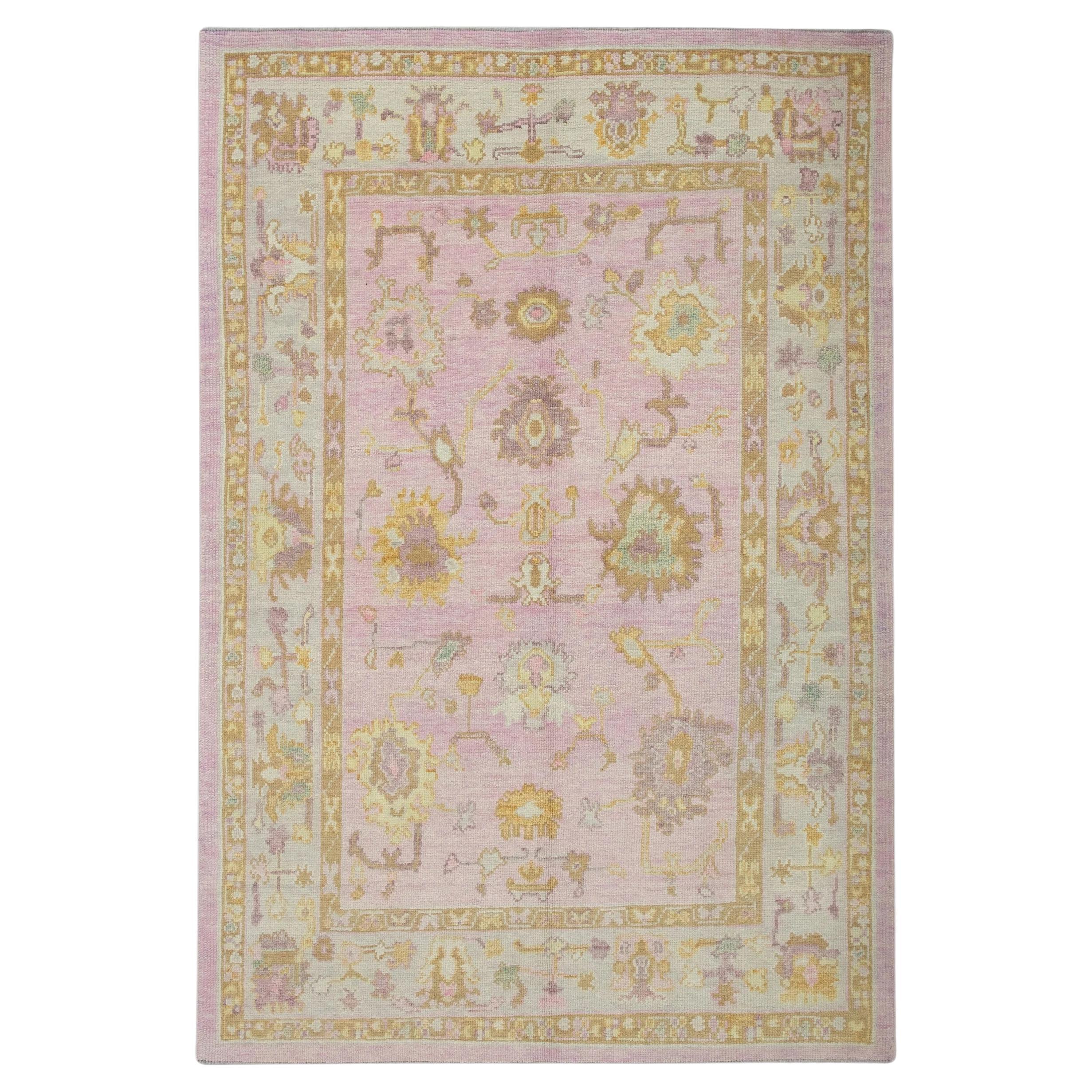Floral Handwoven Wool Turkish Oushak Rug in Soft Pink and Yellow 5'3" x 7'2" For Sale