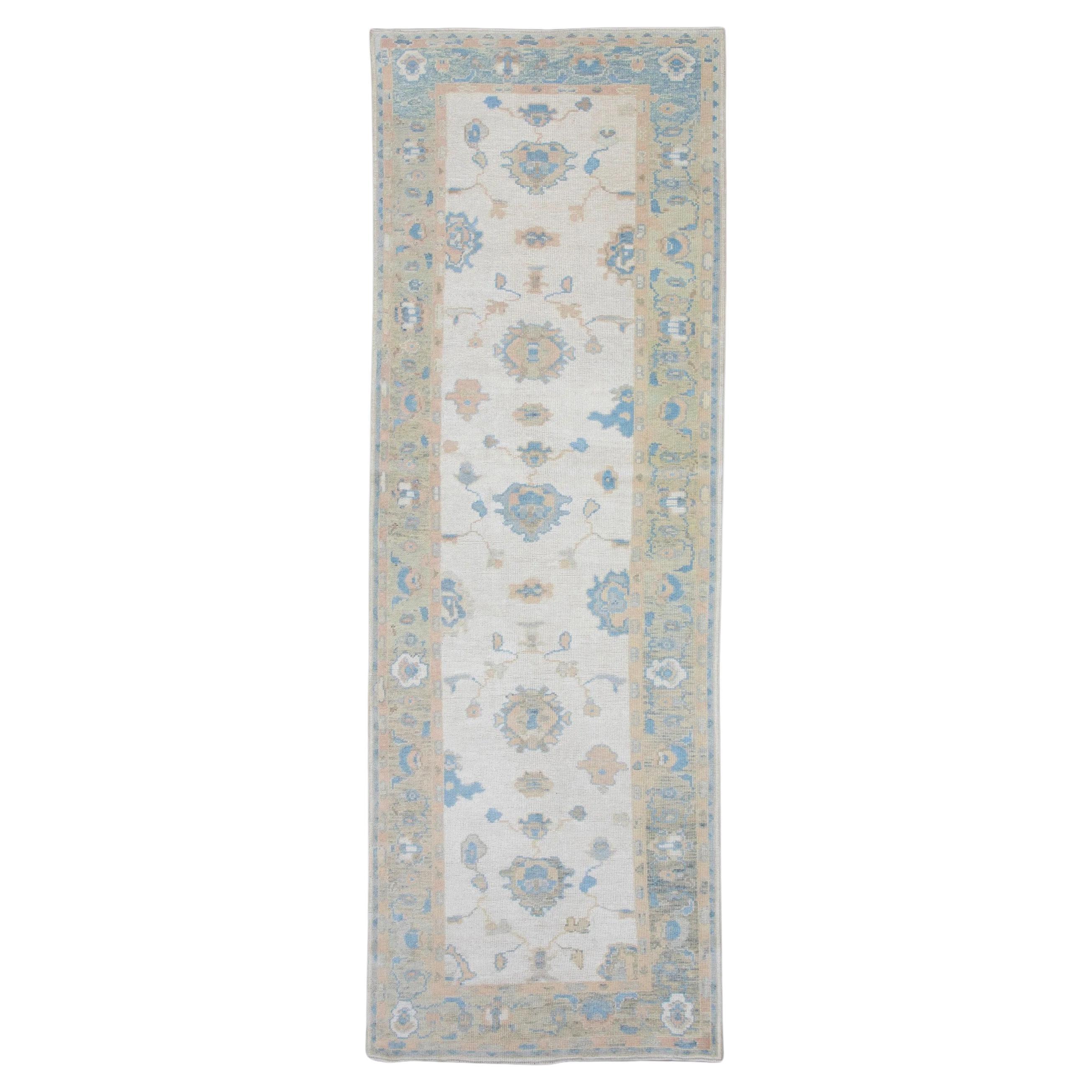 Floral Handwoven Wool Turkish Oushak Rug in Green and Blue 3'9" x 10'9" For Sale