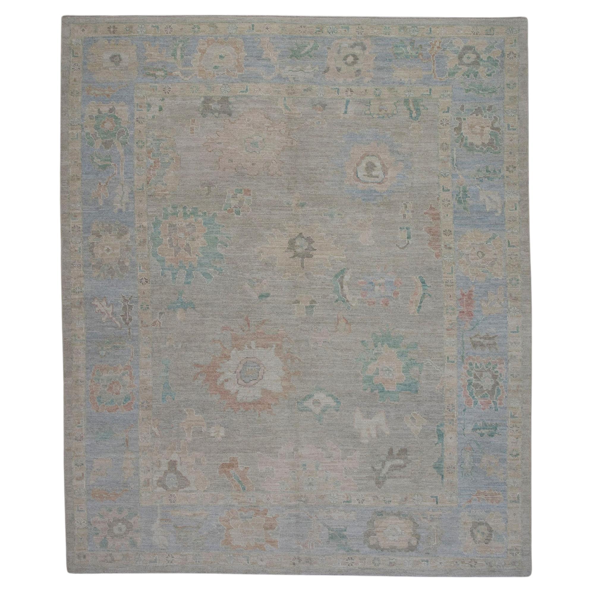 Floral Handwoven Wool Turkish Oushak Rug in Blue Colorway 8'5" x 10'4" For Sale