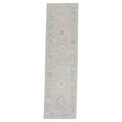 Tapis turc Oushak en laine tissé à la main à motifs floraux multicolores bleu 3' x 10'3".