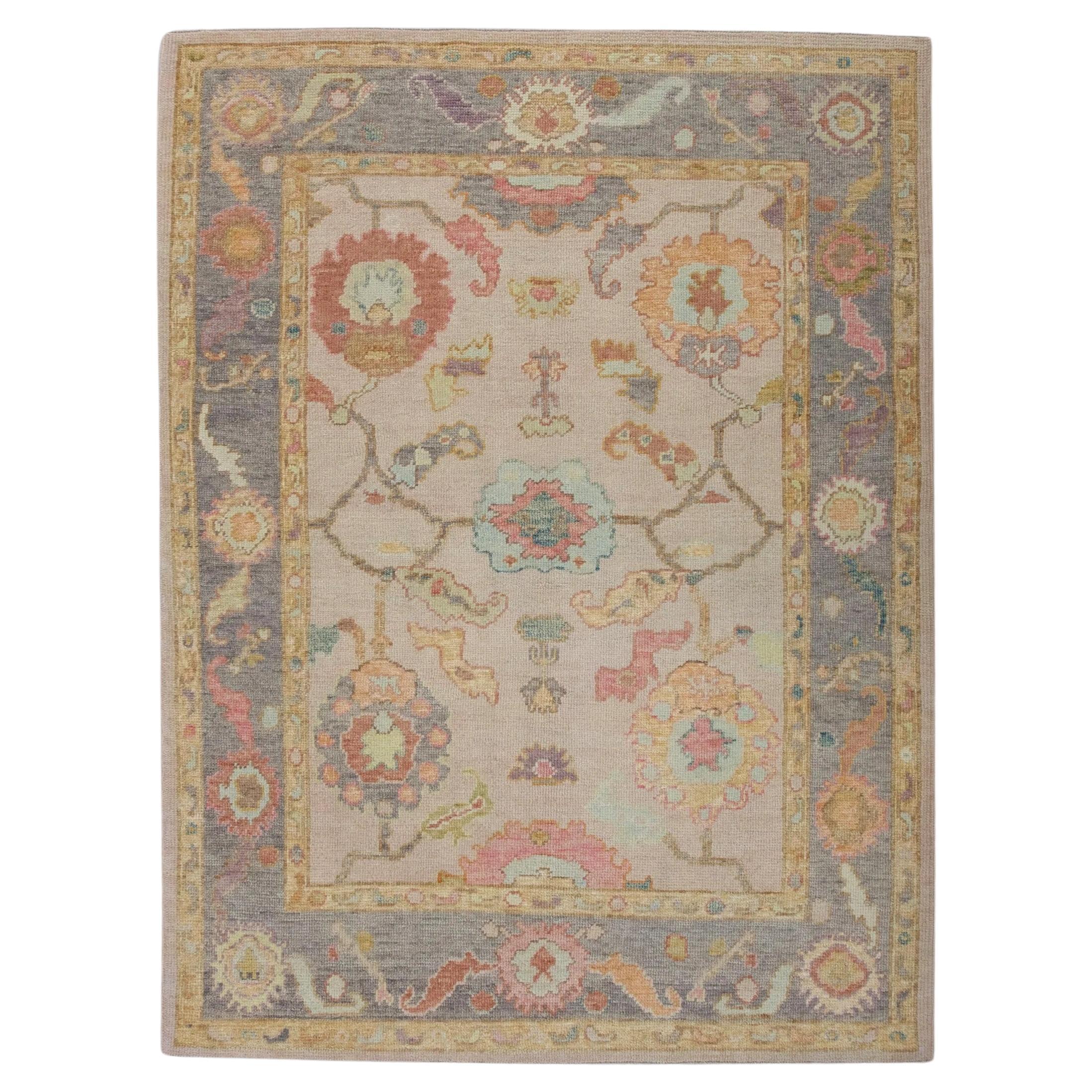 Floral Handwoven Wool Turkish Oushak Rug in Soft Pink and Purple 5' x 6'9" For Sale
