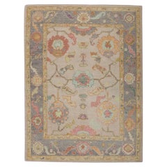 Floral Handwoven Wool Turkish Oushak Rug in Soft Pink and Purple 5' x 6'9"