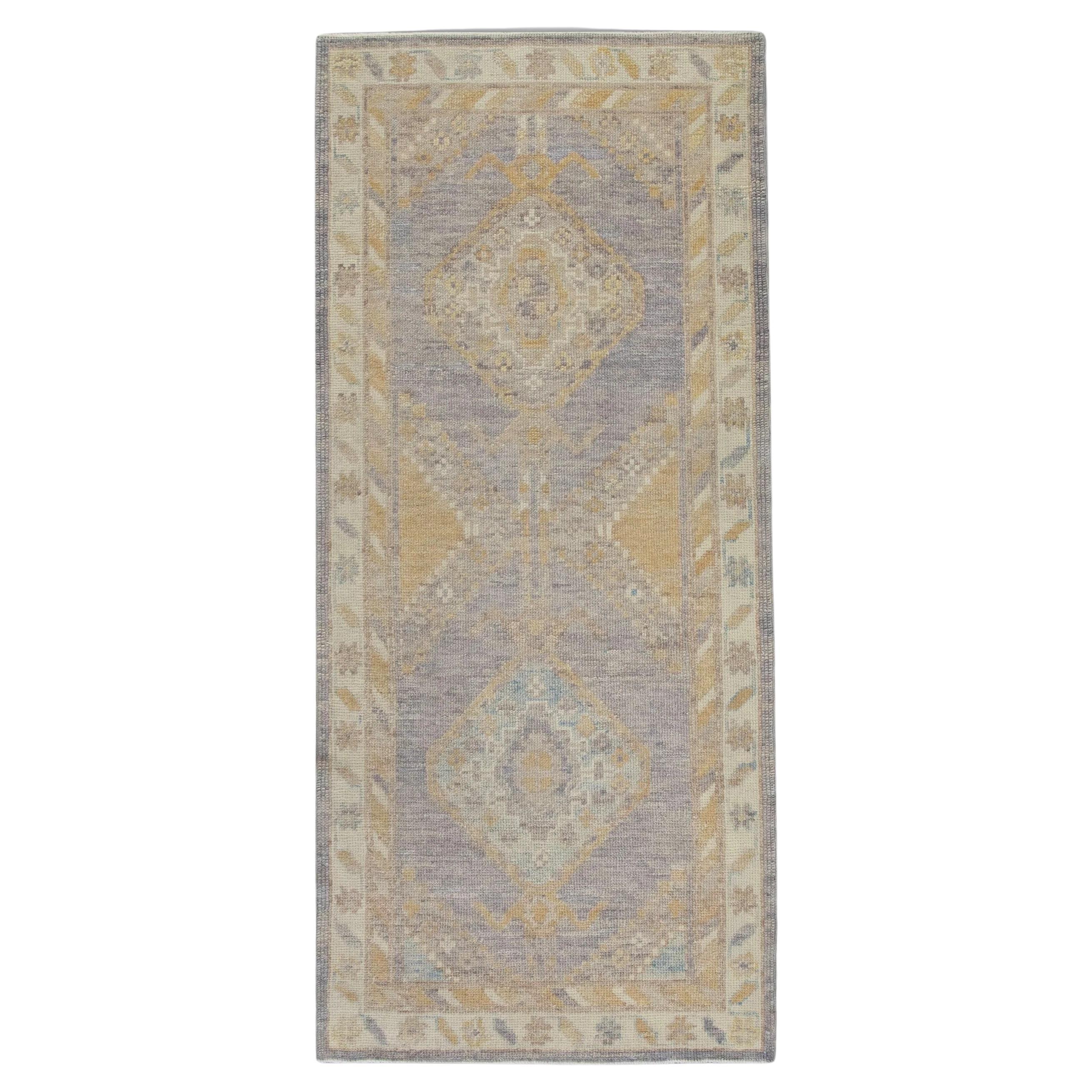 Soft Purple Floral Handwoven Wool Turkish Oushak Rug 3' x 6'6" For Sale