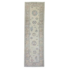 Cream, Blue, and Purple Floral Handwoven Wool Turkish Oushak Rug 3'2" x 9'7"