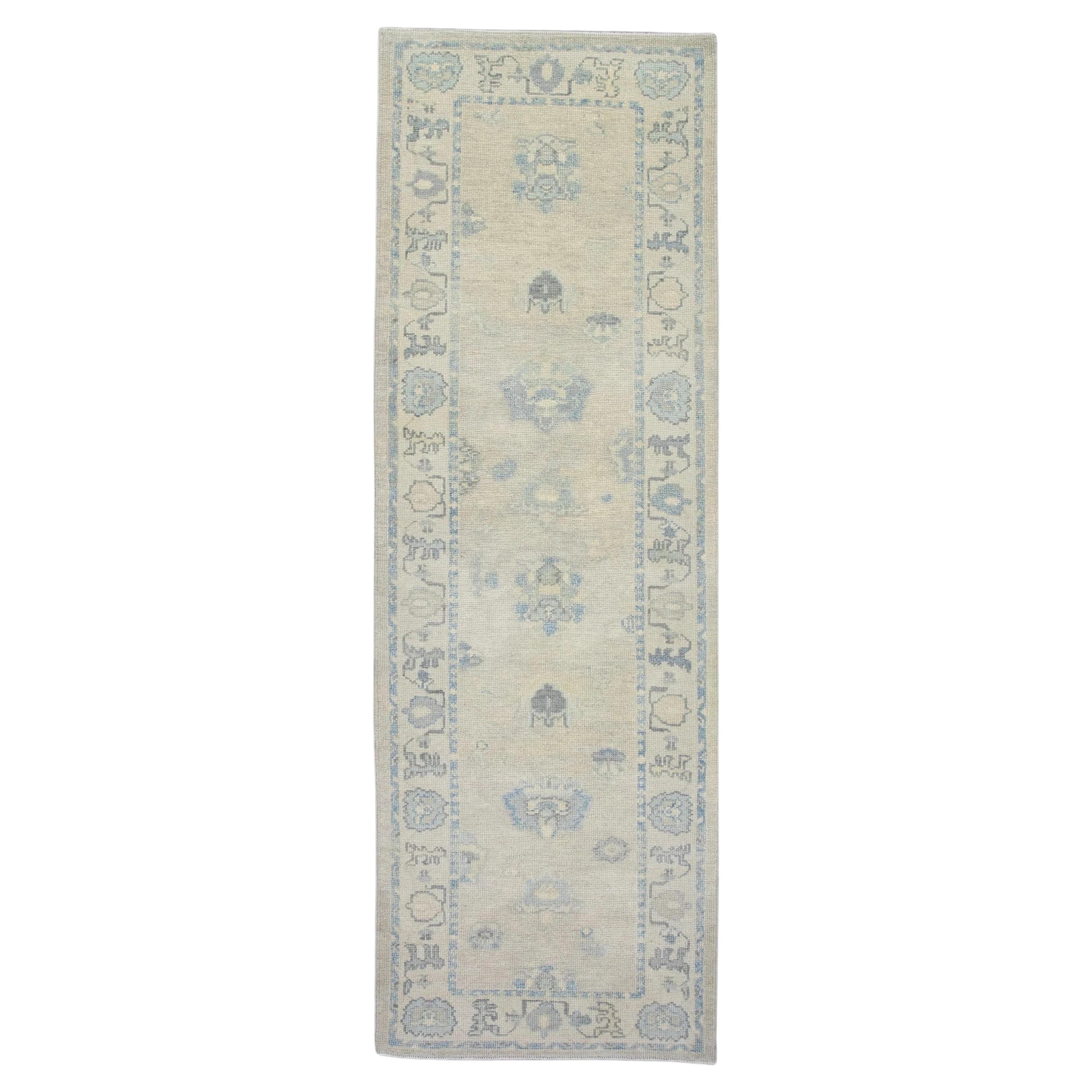 Floral Handwoven Wool Turkish Oushak Rug in Cream and Soft Blue 3'2" x 9'9" For Sale