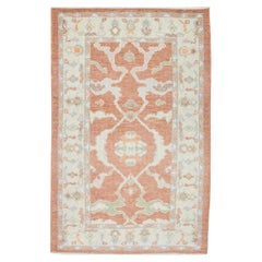 Alfombra Oushak Turca Tejida a Mano Floral en Coral, Crema y Azul 3'2 x 5'1