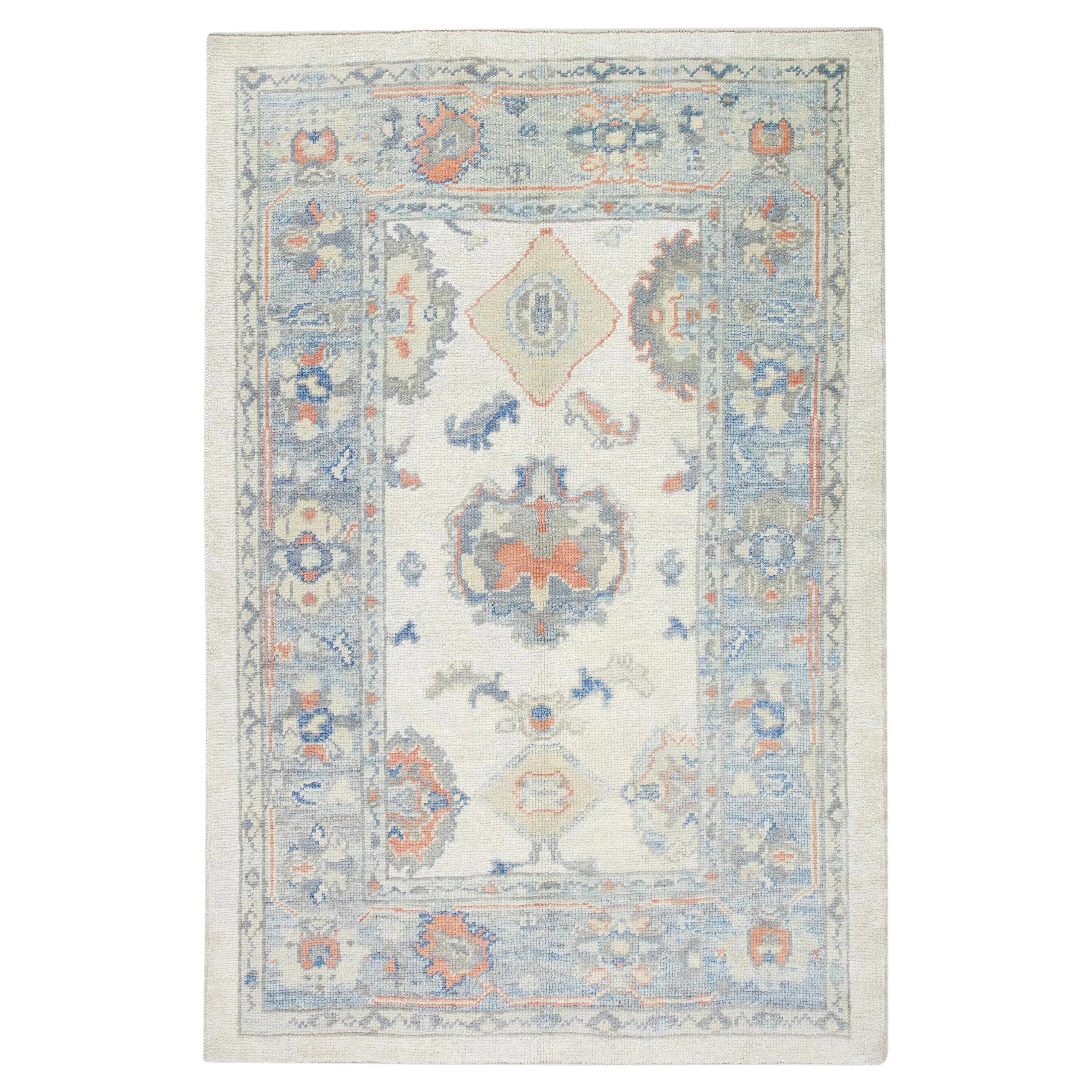 Pastel Blue Floral Design Handwoven Wool Turkish Oushak Rug 4'2" x 5'7" For Sale