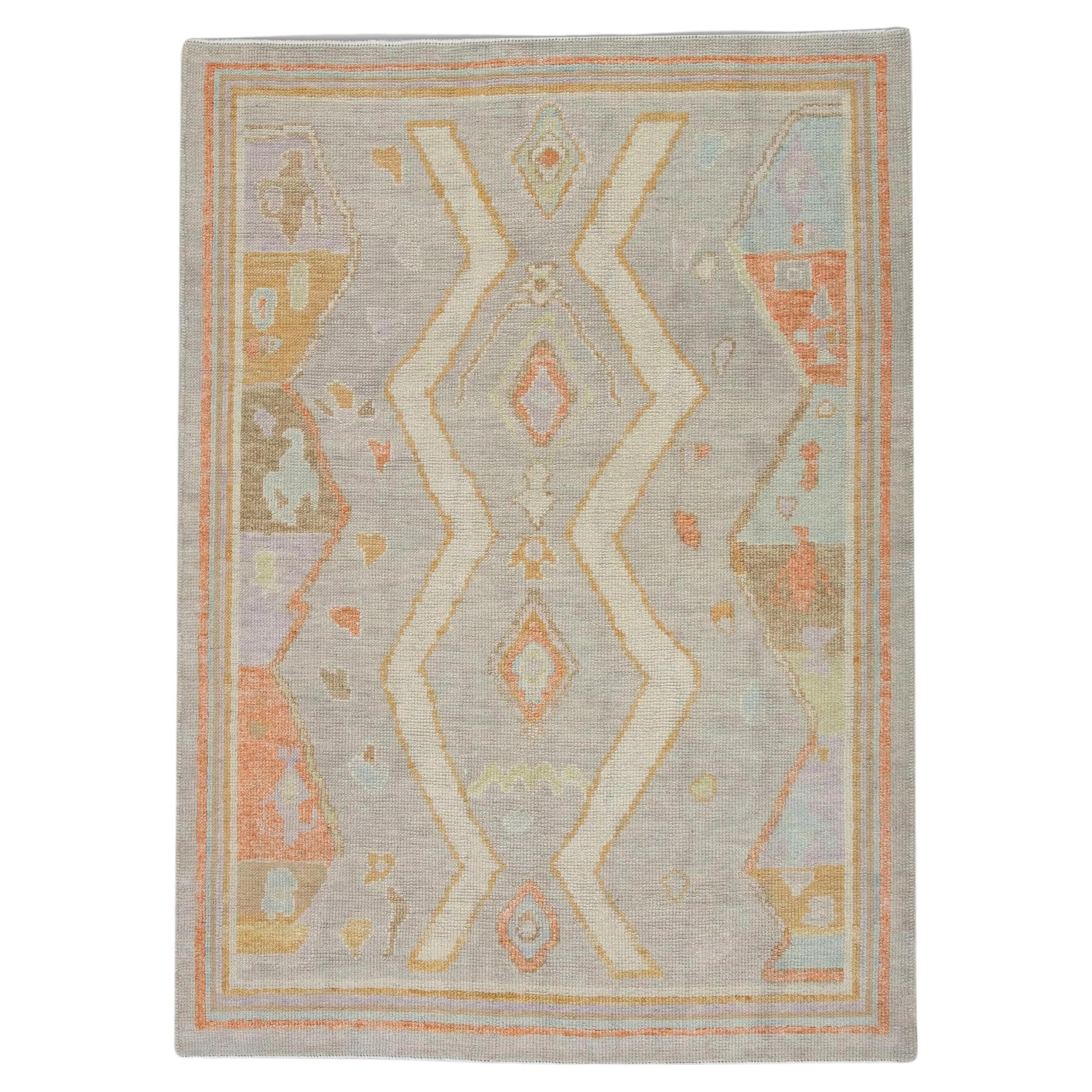 Handwoven Wool Turkish Oushak Rug with Pastel Blue Geometric Design 4'1" x 5'7" For Sale
