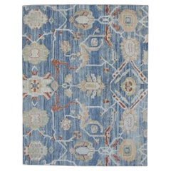 Tapis turc Oushak en laine bleue tissée à la main avec motifs floraux rouges 8' x 6'7"