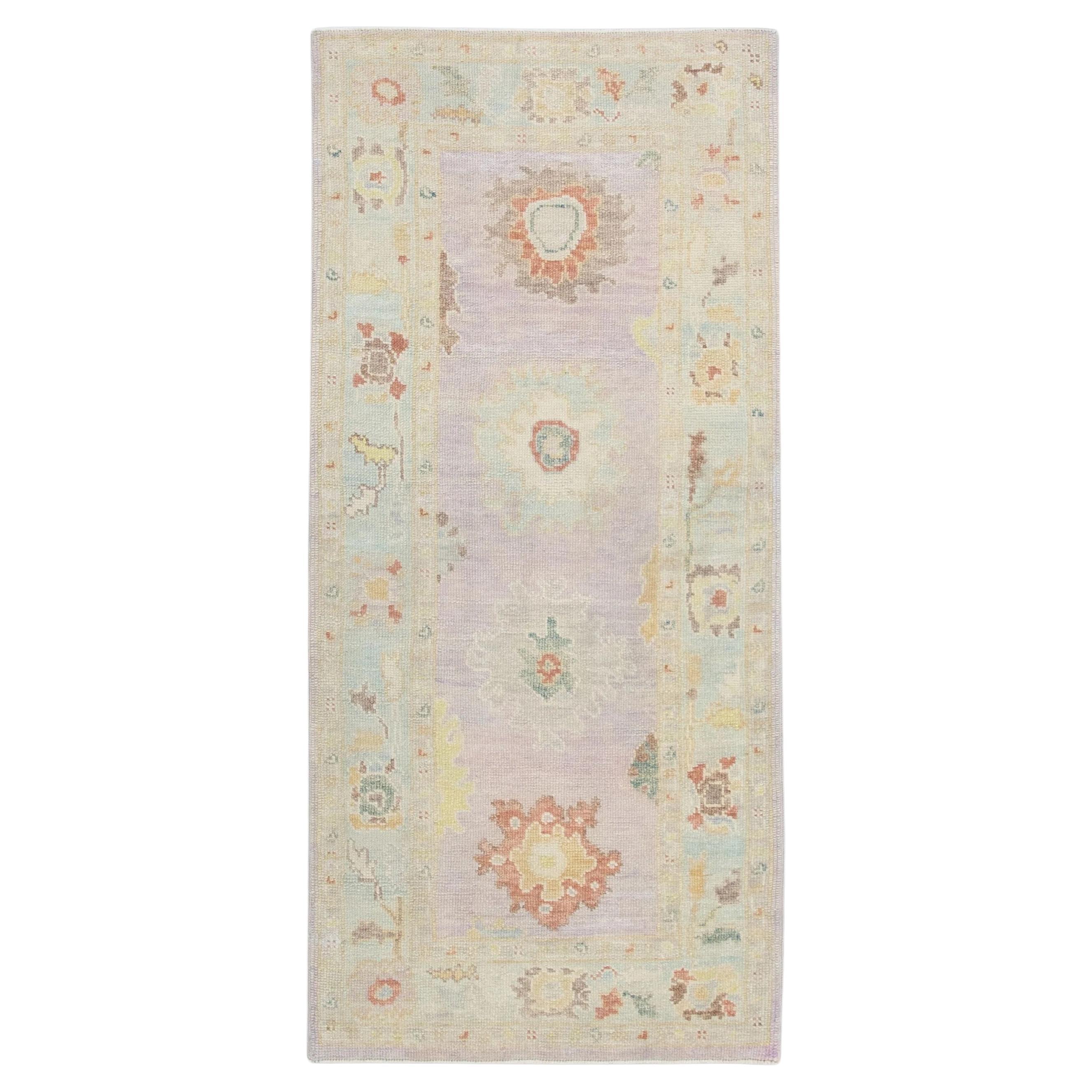 Floral Handwoven Wool Turkish Oushak Rug with Soft Lavender Design 3'2" x 6'8" For Sale