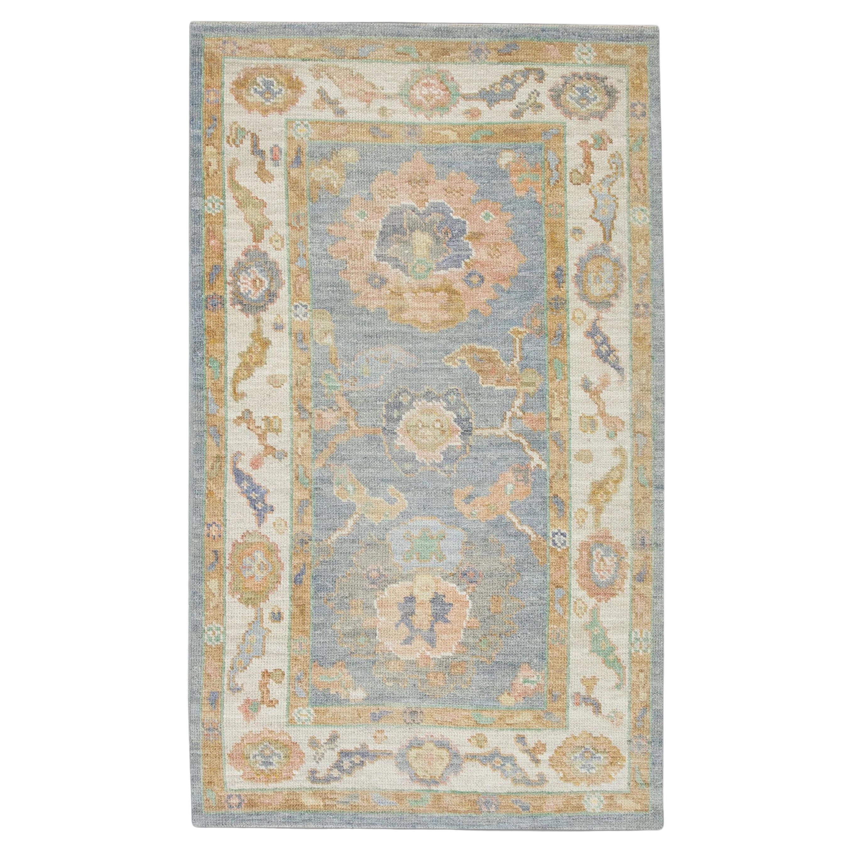 Floral Handwoven Wool Turkish Oushak Rug with Blue Field Yellow Border 2'11 X 5' For Sale