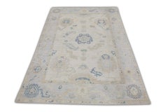 Alfombra turca Oushak Marfil Azul Beige Alfombra de lana tejida a mano 4'8" x 6'10"