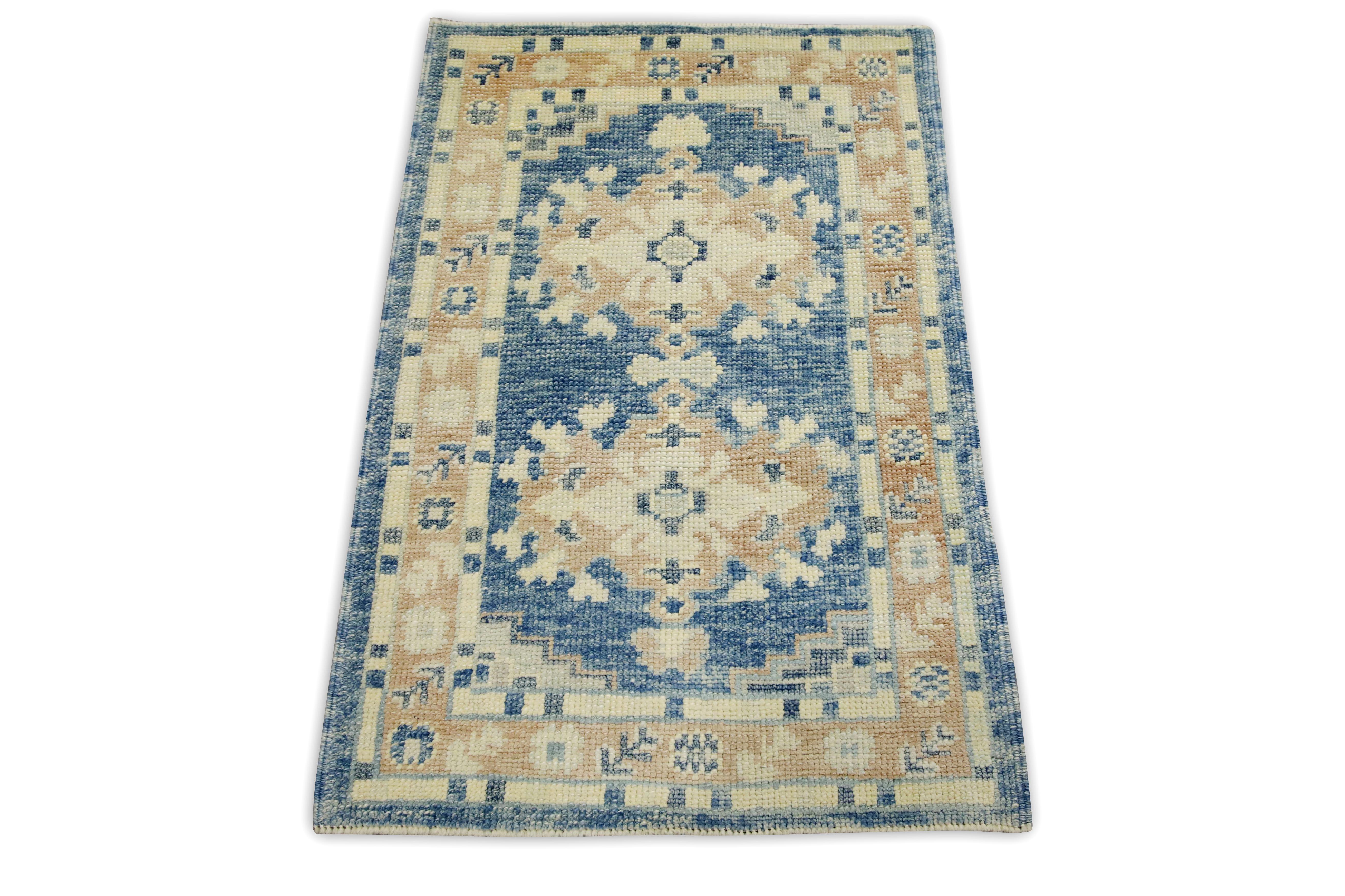 Introduce a touch of timeless elegance to your home with this exquisite Handmade Turkish Oushak Oriental Rug, measuring 2'3