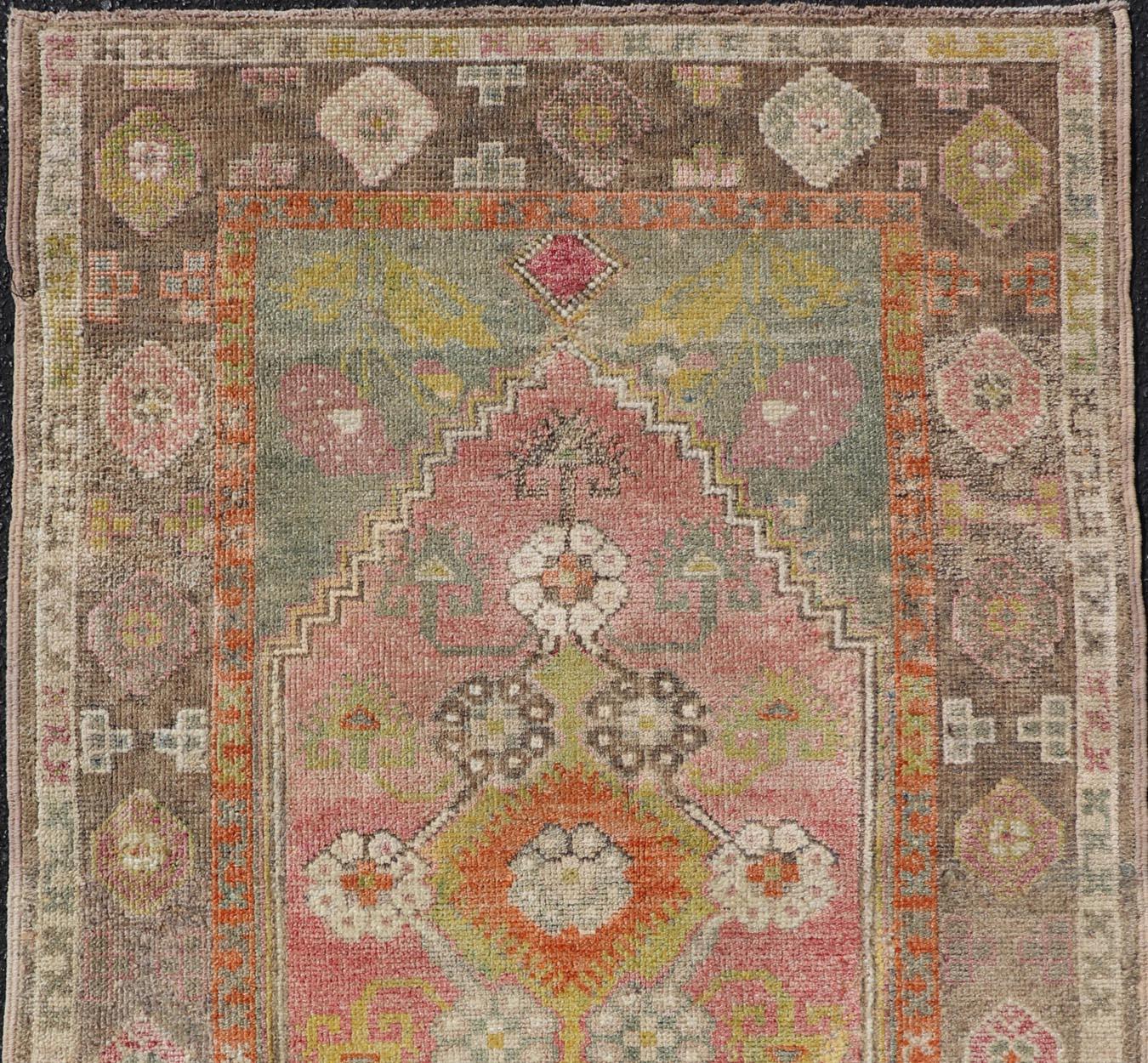 Hand-Knotted Turkish Oushak Rug -Pastel Pink, Green, and Yellow Floral Medallions 3'5 x 5'8 For Sale