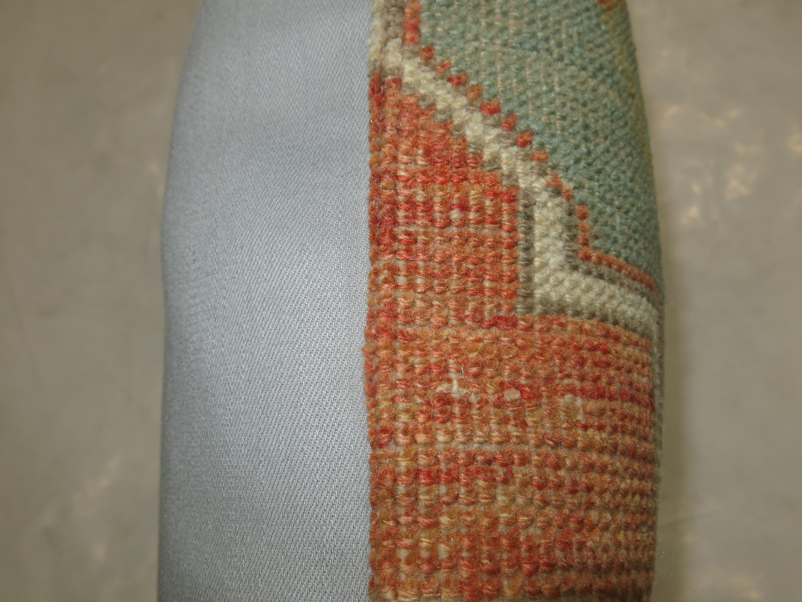 Pillow made from a Turkish Oushak rug.

17'' x 18''