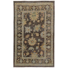 Turkish Oushak Rug with Blue and Beige Flower Patterns on Brown Field