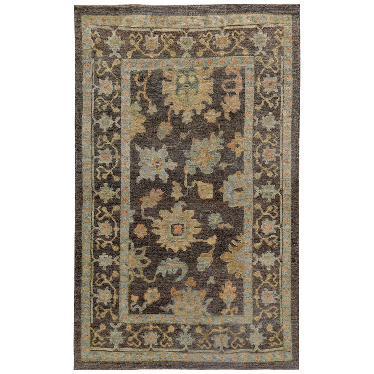 Oushak Rug Patterns Turkish Oushak Rug with Blue and Beige Flower Patterns on Brown Field ...