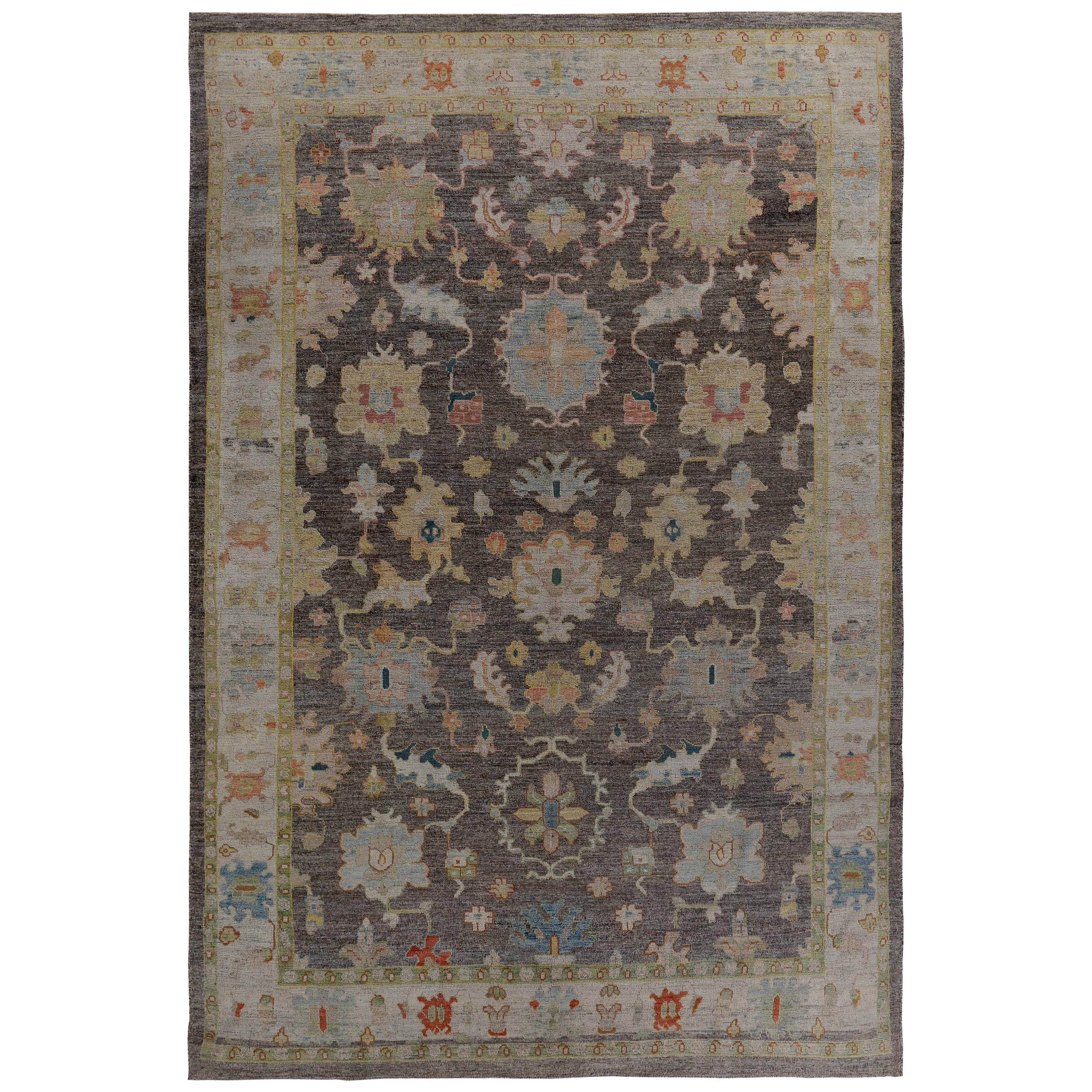 Turkish Oushak Rug with Blue and Gold Floral Details on Brown and Ivory Field For Sale