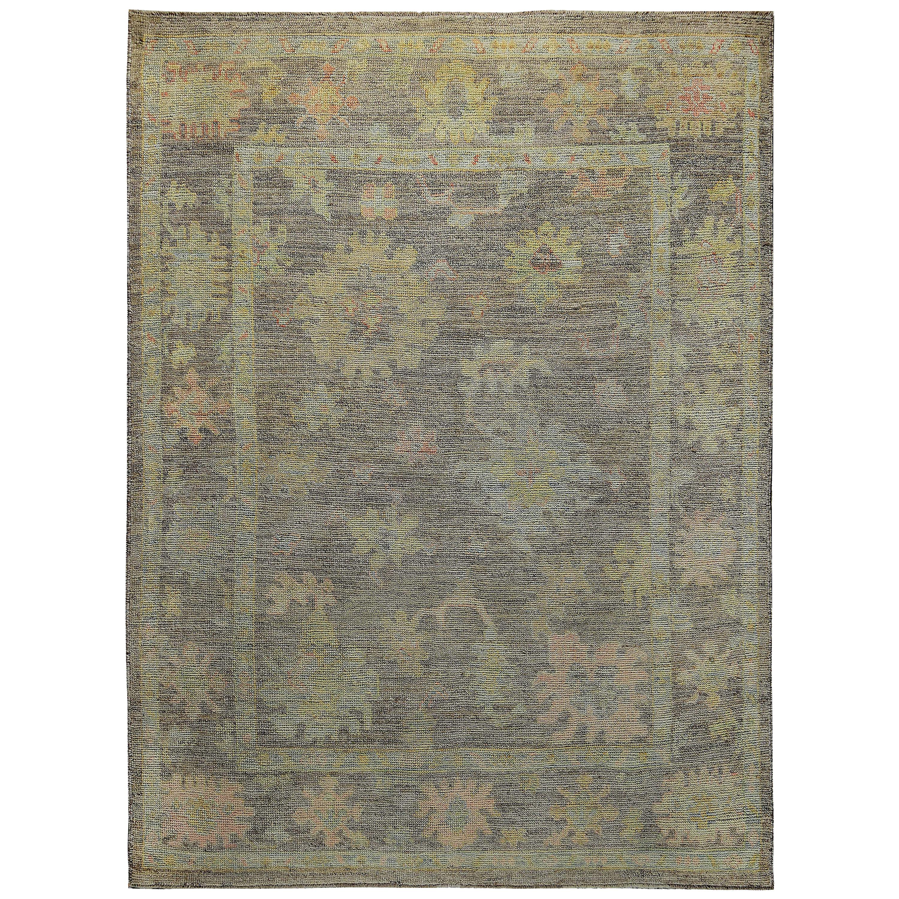 Turkish Oushak Rug with Blue and Pink Floral Heads on Brown Field For Sale