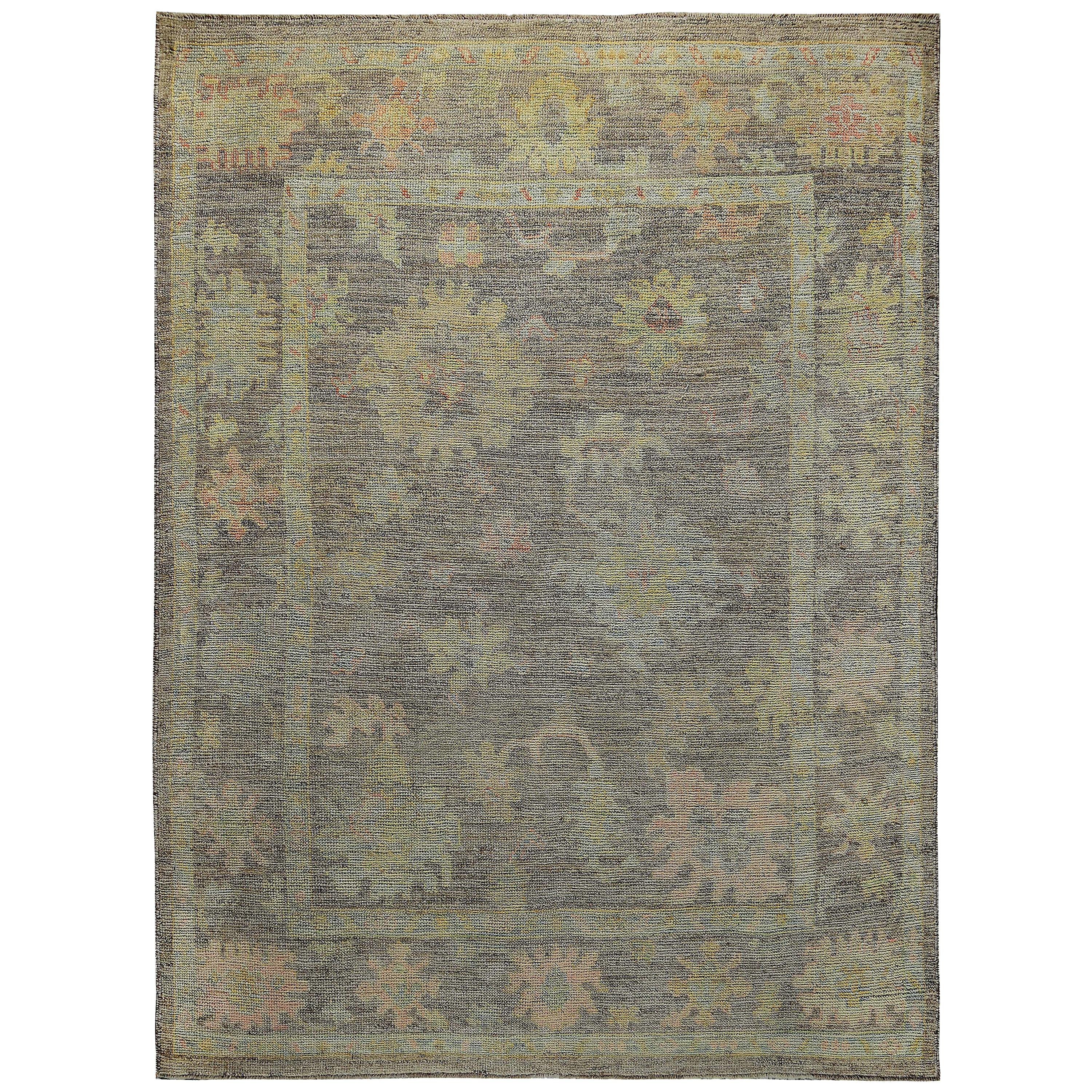 Turkish Oushak Rug with Blue and Pink Floral Heads on Brown Field