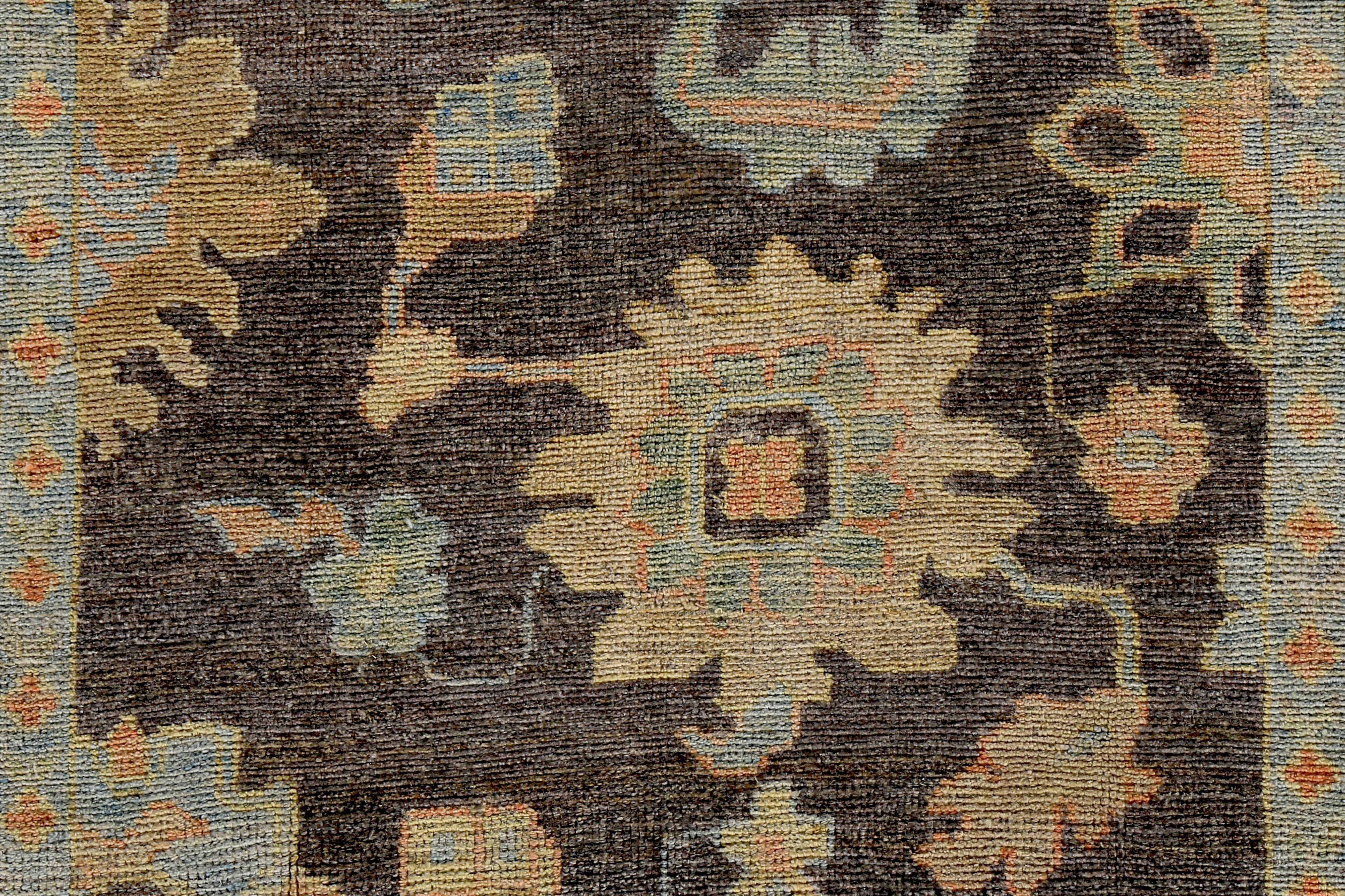 Hand-Woven Turkish Oushak Rug with Blue and Beige Flower Patterns on Brown Field For Sale