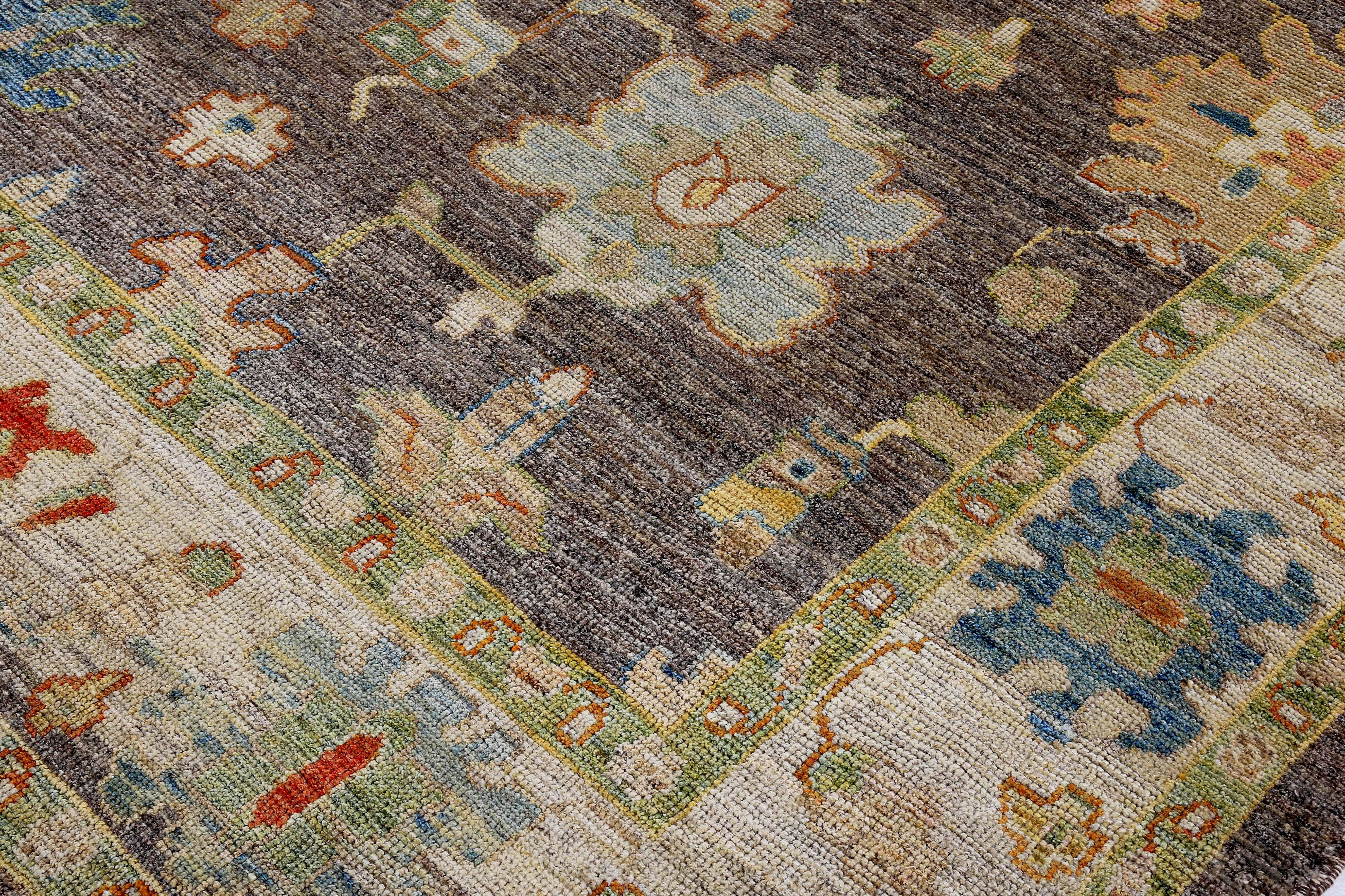 Wool Turkish Oushak Rug with Blue and Gold Floral Details on Brown and Ivory Field For Sale