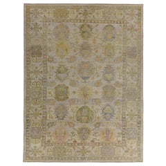Turkish Oushak Rug with Blue, Orange and Green Flower Heads on Beige Field