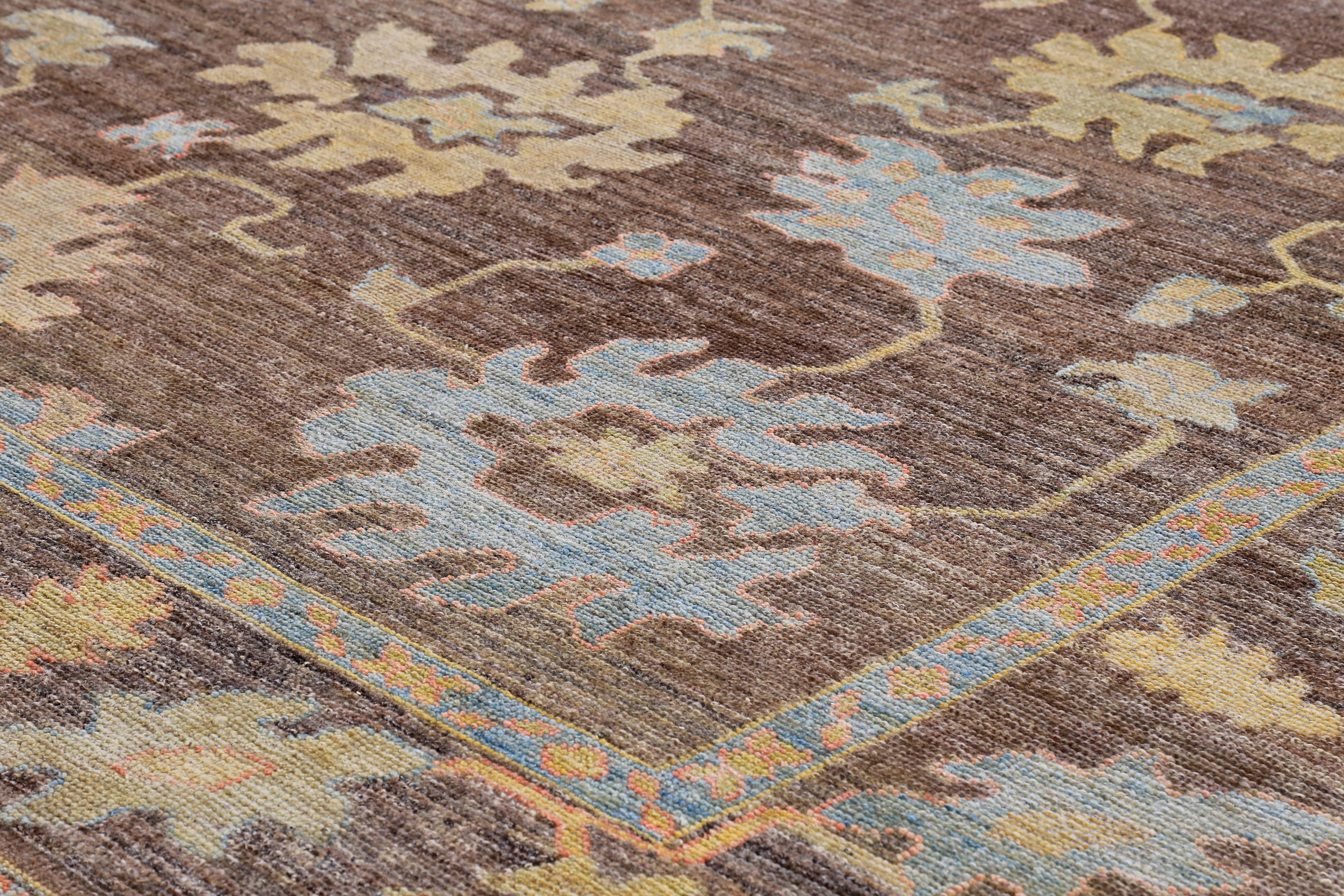 Contemporary Turkish Oushak Rug with Blue, Orange and Green Flower Heads on Brown Field For Sale