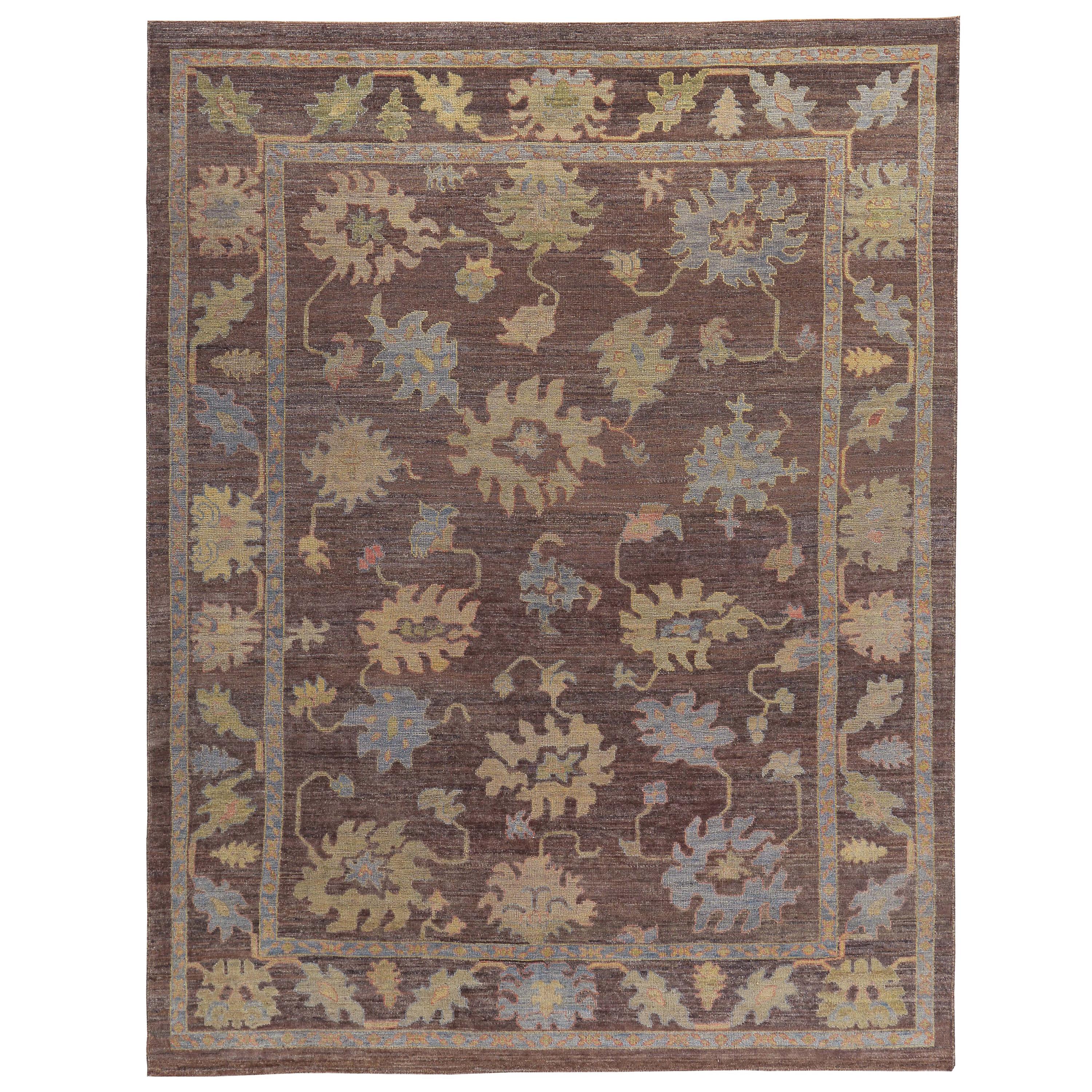 Turkish Oushak Rug with Blue, Orange and Green Flower Heads on Brown Field For Sale
