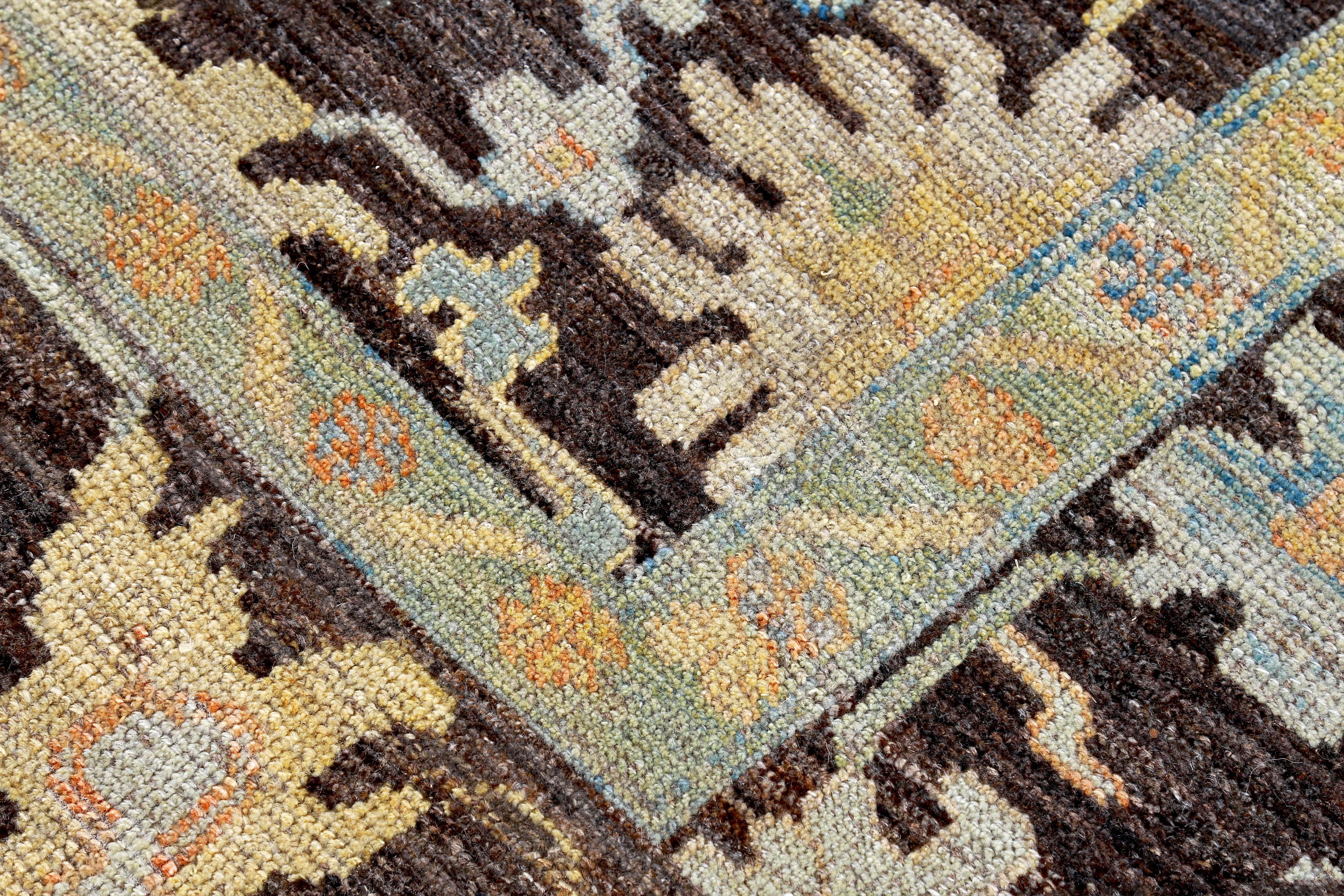 Wool Turkish Oushak Rug with Blue, Orange and Yellow Flower Heads on Brown Field For Sale