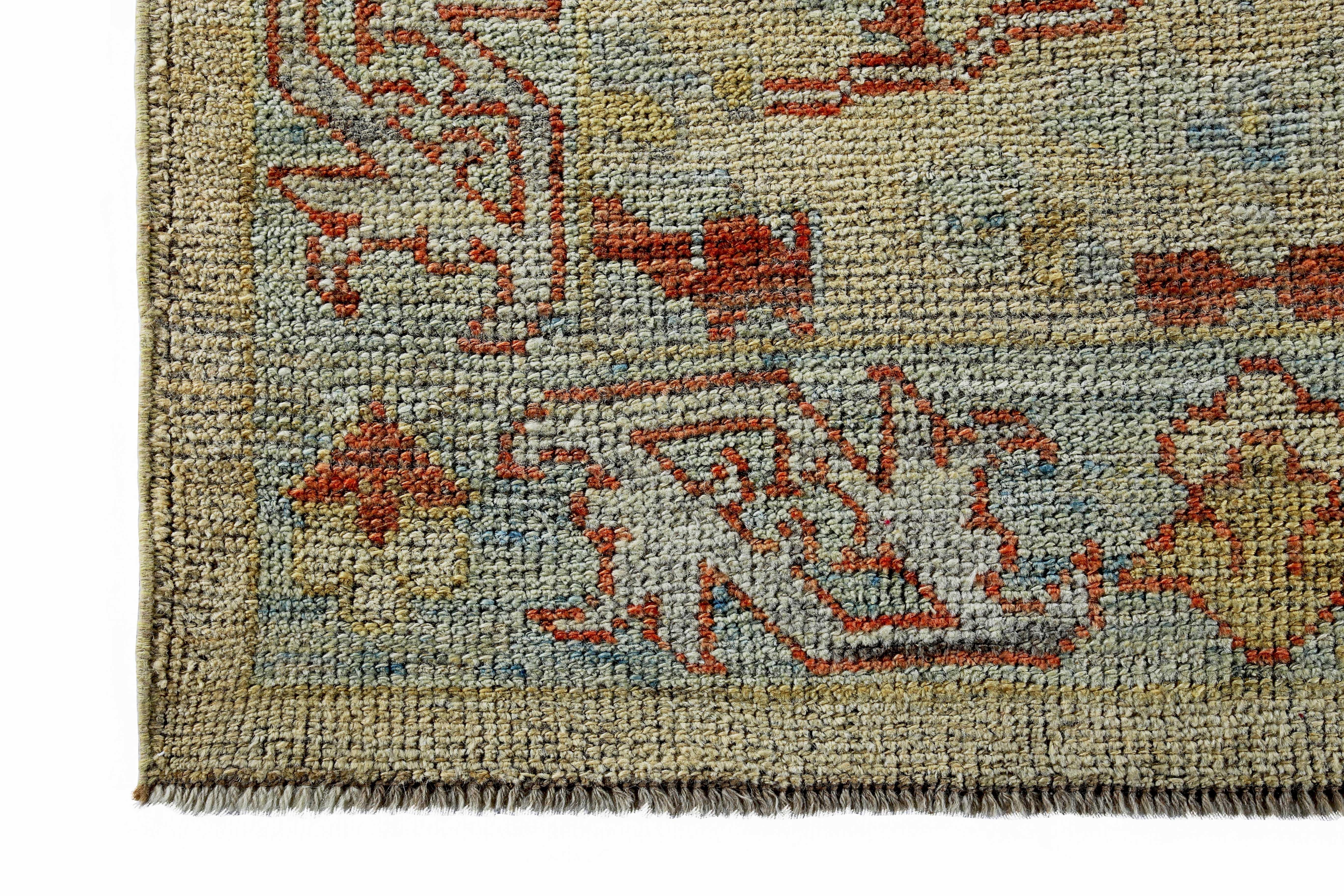 Hand-Woven Turkish Oushak Rug with Blue and Rust Floral Details on Ivory Field For Sale