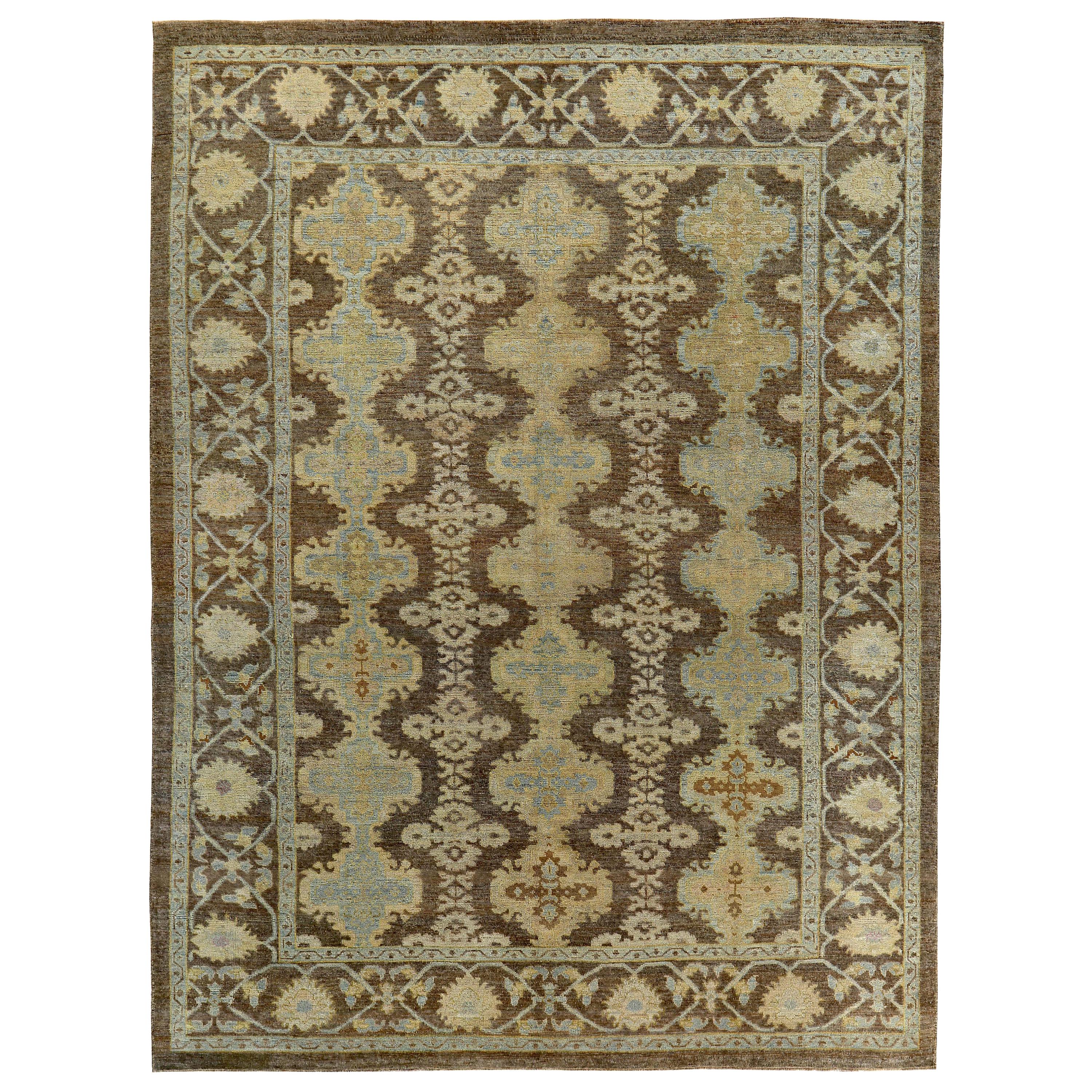 Turkish Oushak Rug with Blue, Yellow and Beige Flower Heads on Brown Field For Sale