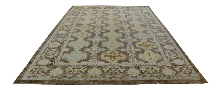 Turkish rug made of handwoven sheep’s wool of the finest quality. It’s colored with organic vegetable dyes that are certified safe for humans and pets alike. It features blue, beige and yellow flower heads on a beautiful brown field. Flower patterns