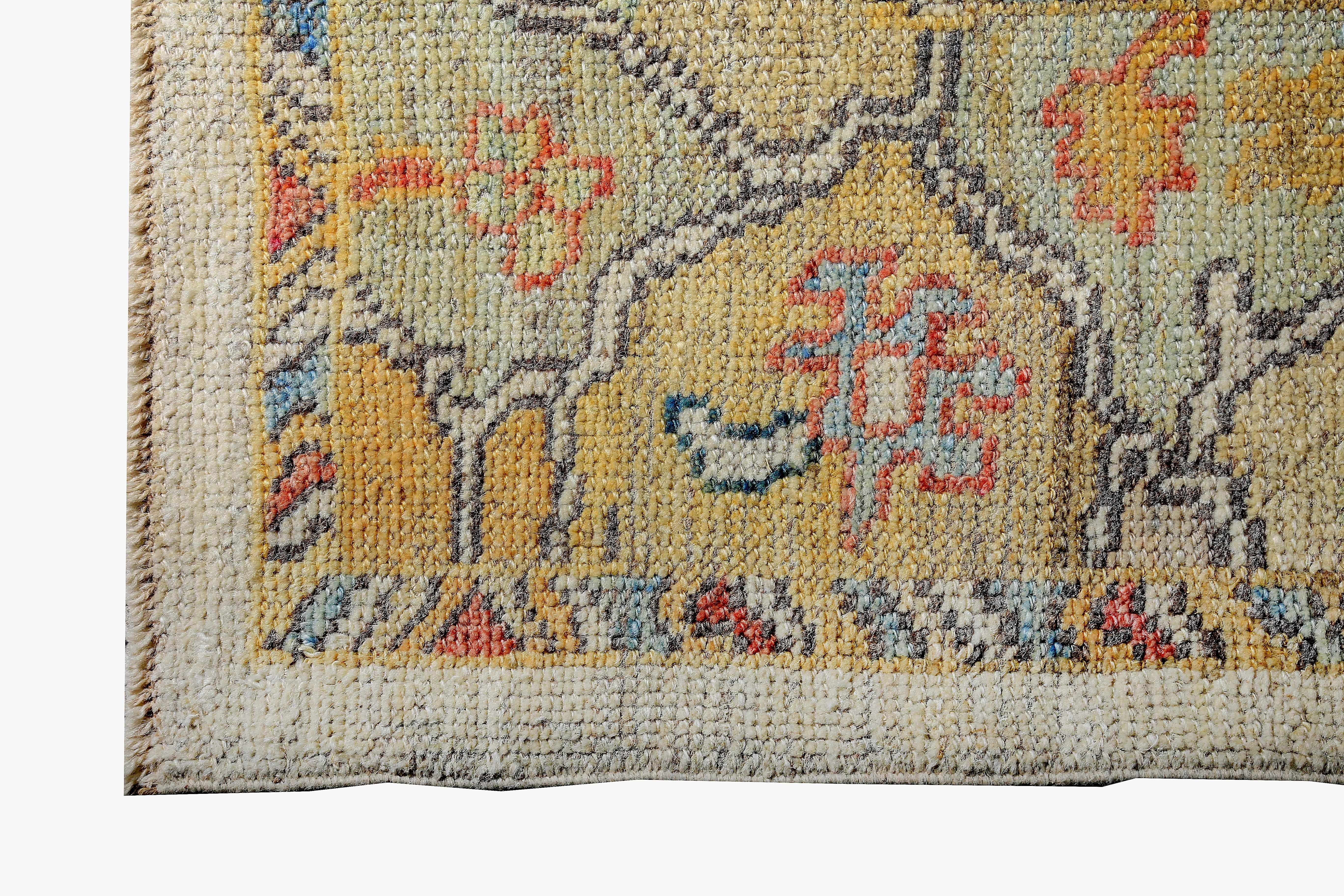 Hand-Woven Turkish Oushak Rug with Blue & Yellow Floral Details on Ivory Field For Sale