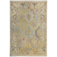 Turkish Oushak Rug with Brown and Gray Floral Details on Yellow and Ivory Field