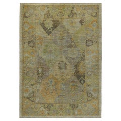 Turkish Oushak Rug with Brown and Orange Floral Details on Ivory Field