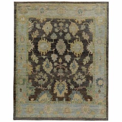 Turkish Oushak Rug with Gold and Blue Floral Details on Brown and Ivory Field