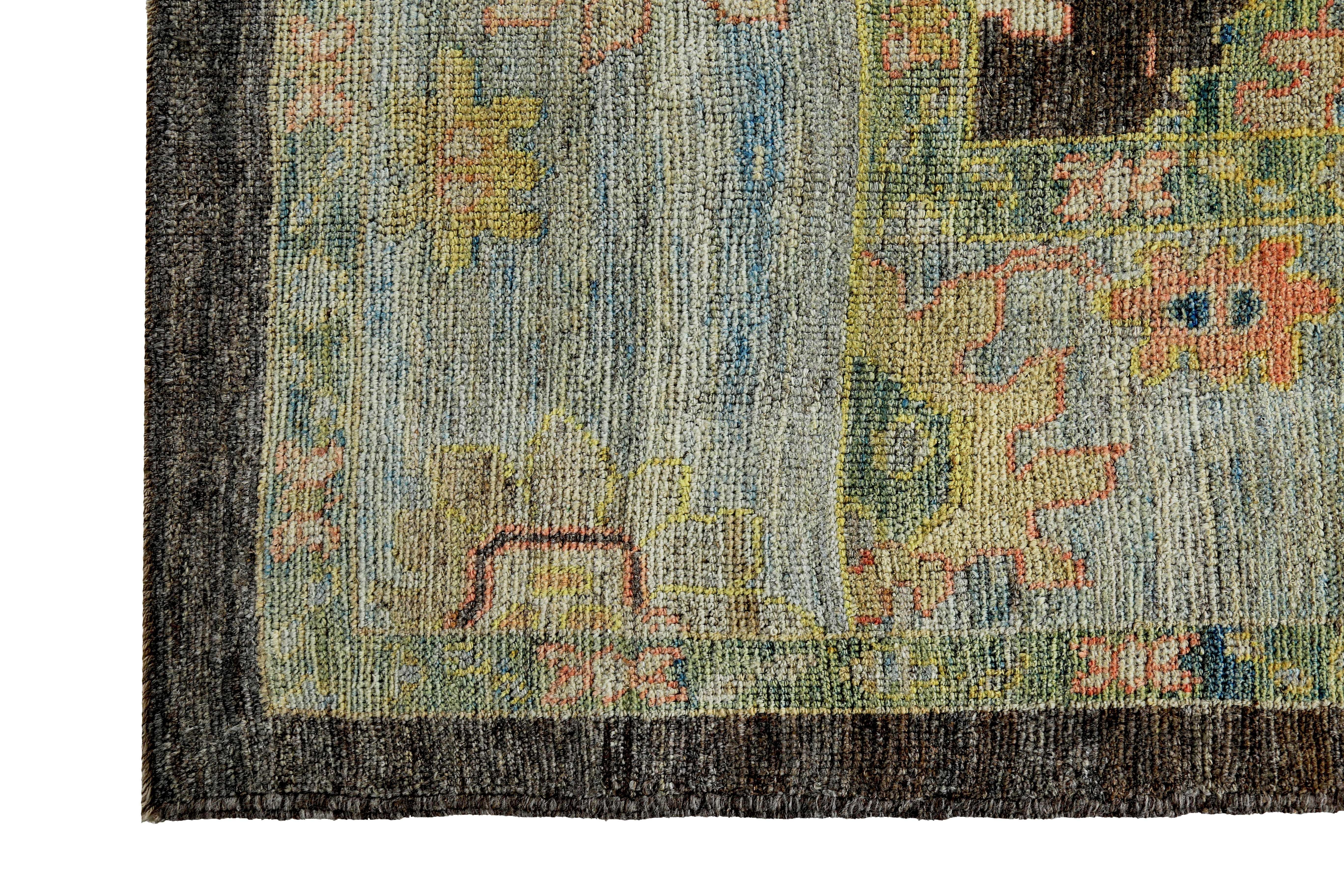 Wool Turkish Oushak Rug with Gold and Blue Floral Details on Brown and Ivory Field For Sale