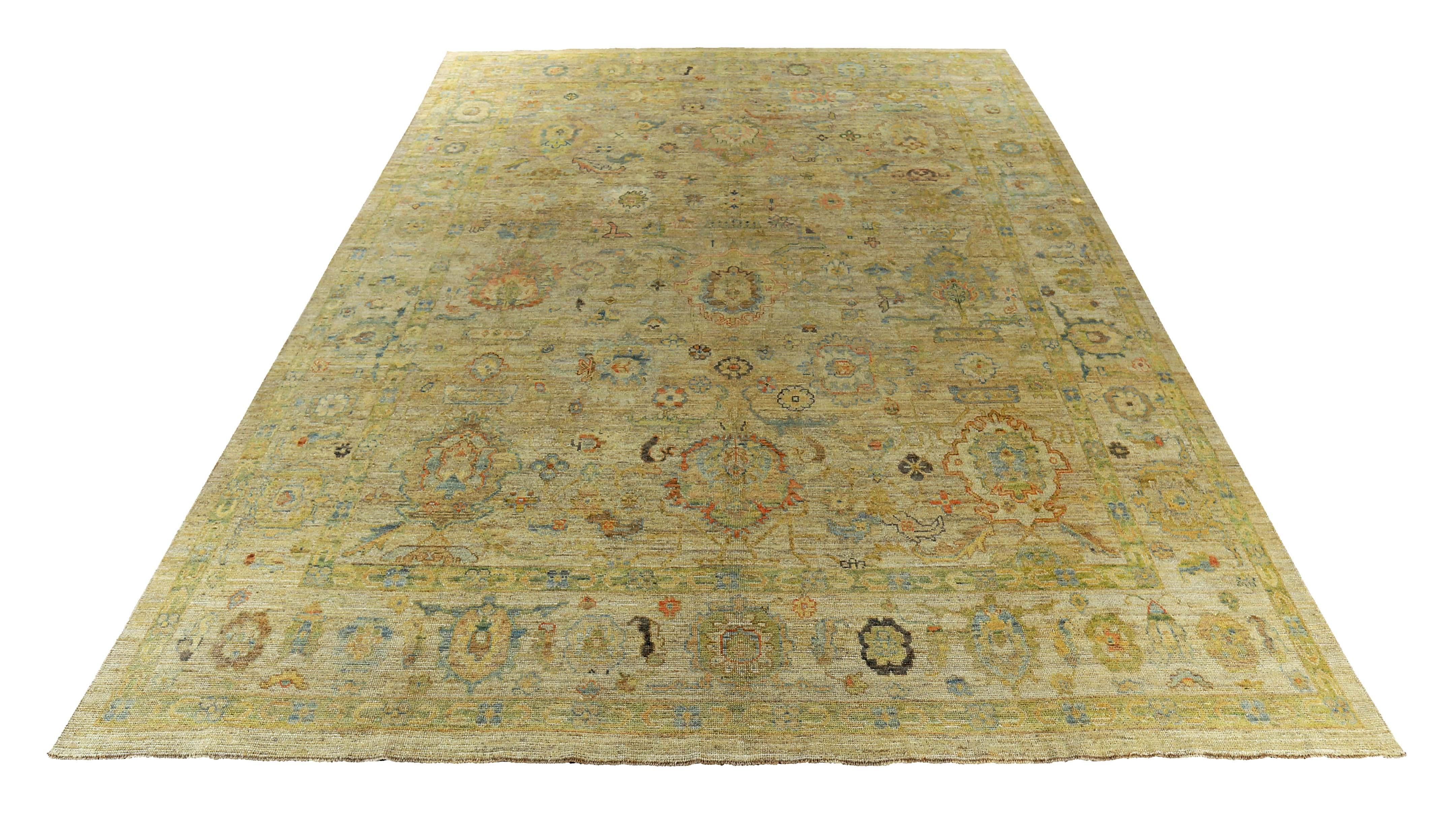 New Turkish rug made of handwoven sheep’s wool of the finest quality. It’s colored with organic vegetable dyes that are certified safe for humans and pets alike. It features green and gold floral details on a lovely ivory field. Flower patterns are