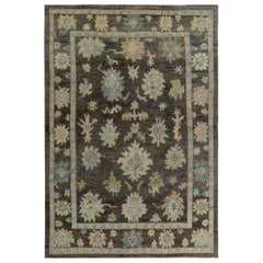 Turkish Oushak Rug with Ivory and Blue Floral Details on Brown Field
