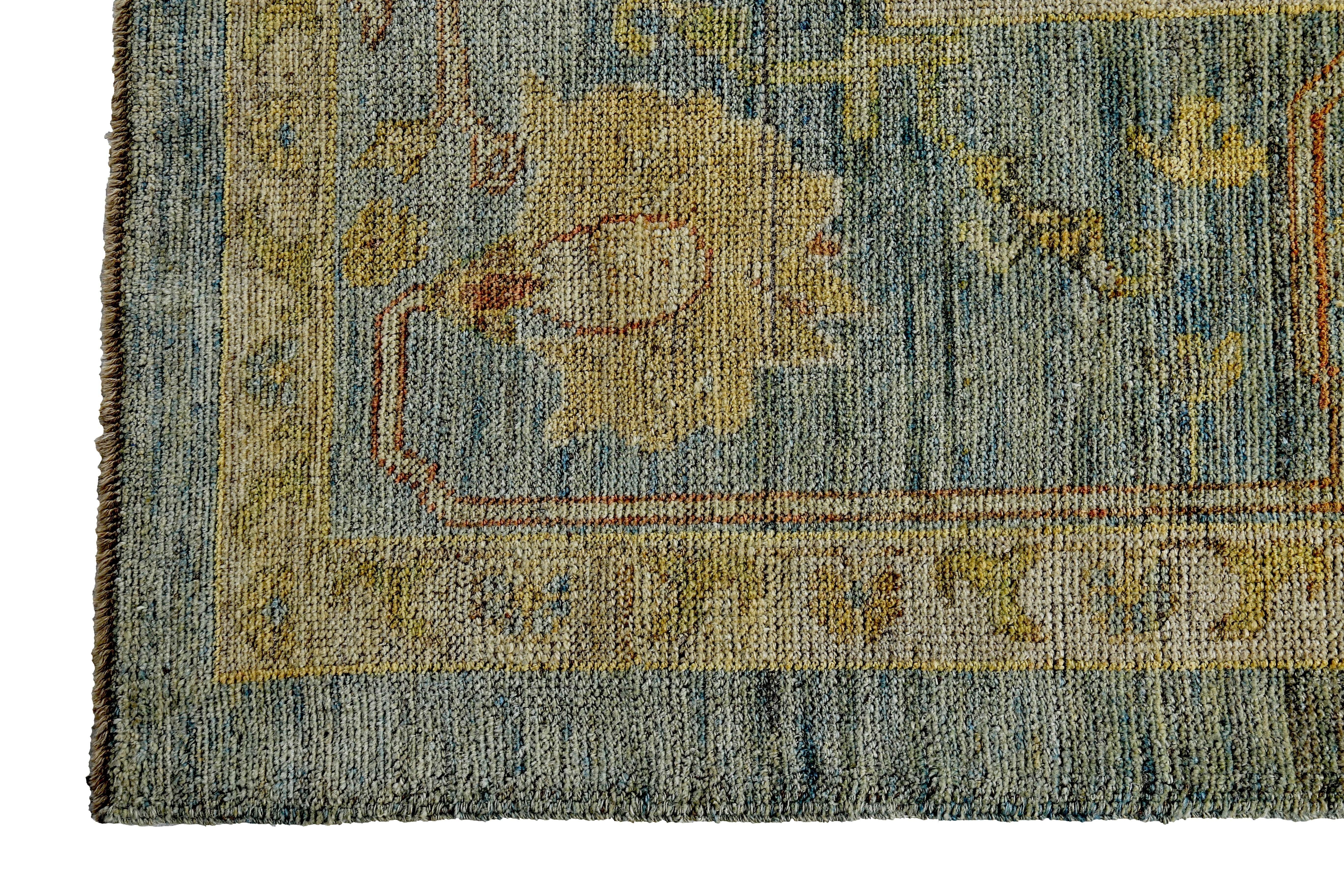 Contemporary Turkish Oushak Rug with Ivory & Gold Floral Details on Blue Field For Sale